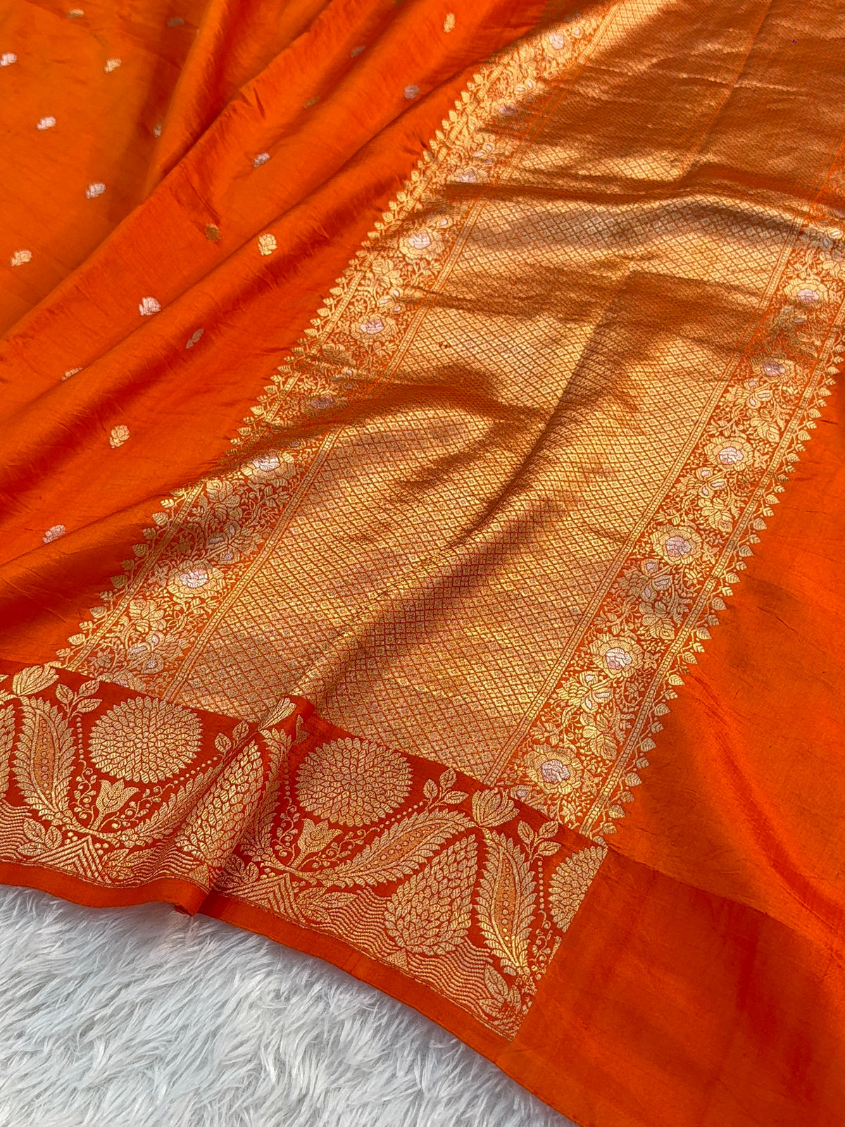 Banarasi Raw Mango Silk Saree in Border and Buti Design in Silver and Gold Zari work in a orange Color