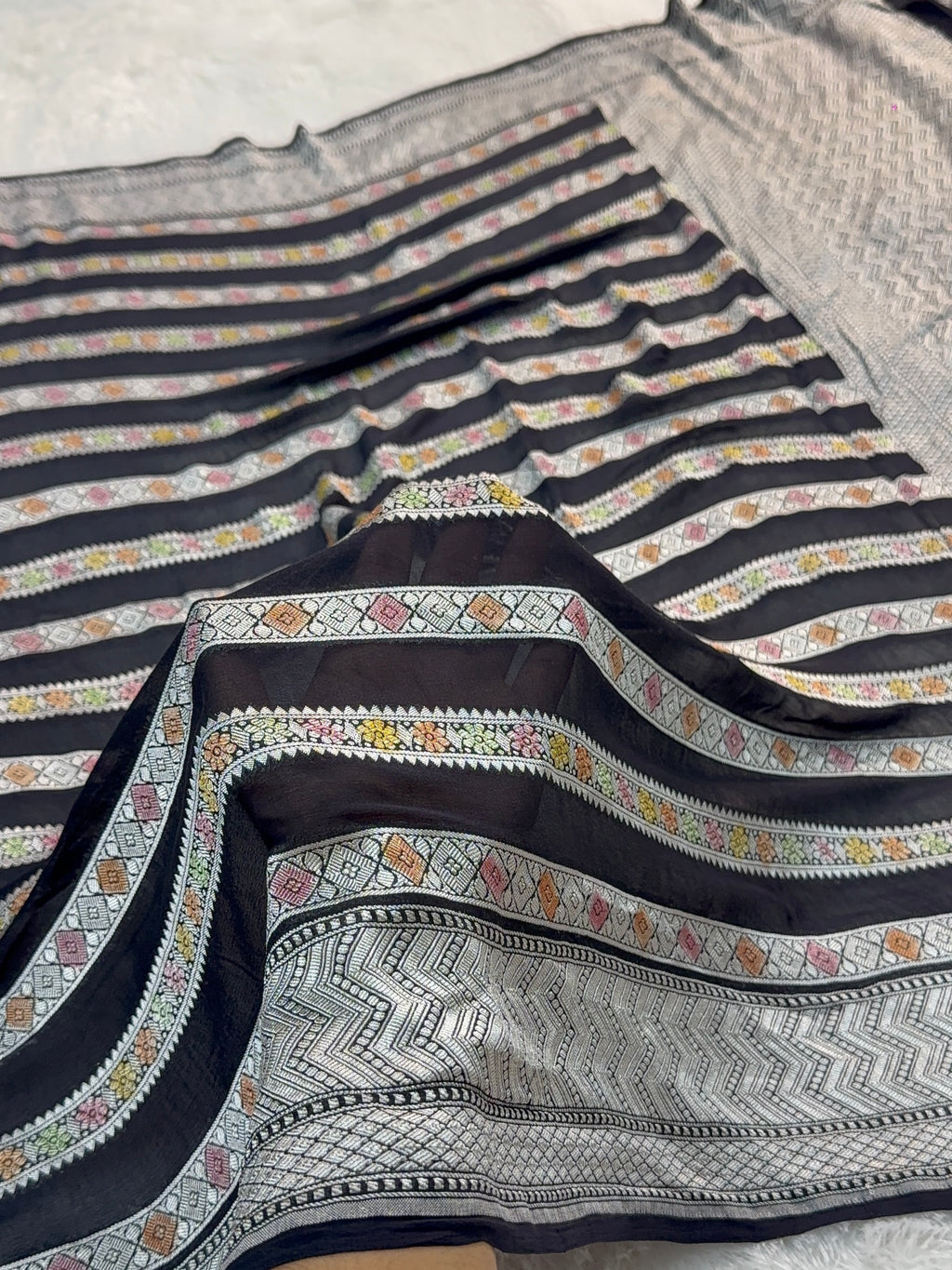 Banarasi Pure Khaddi Chiffon Saree  with Silver Zari Work In Horizontal stripes pattern Design with Meenakari by hand brush in Black Colour