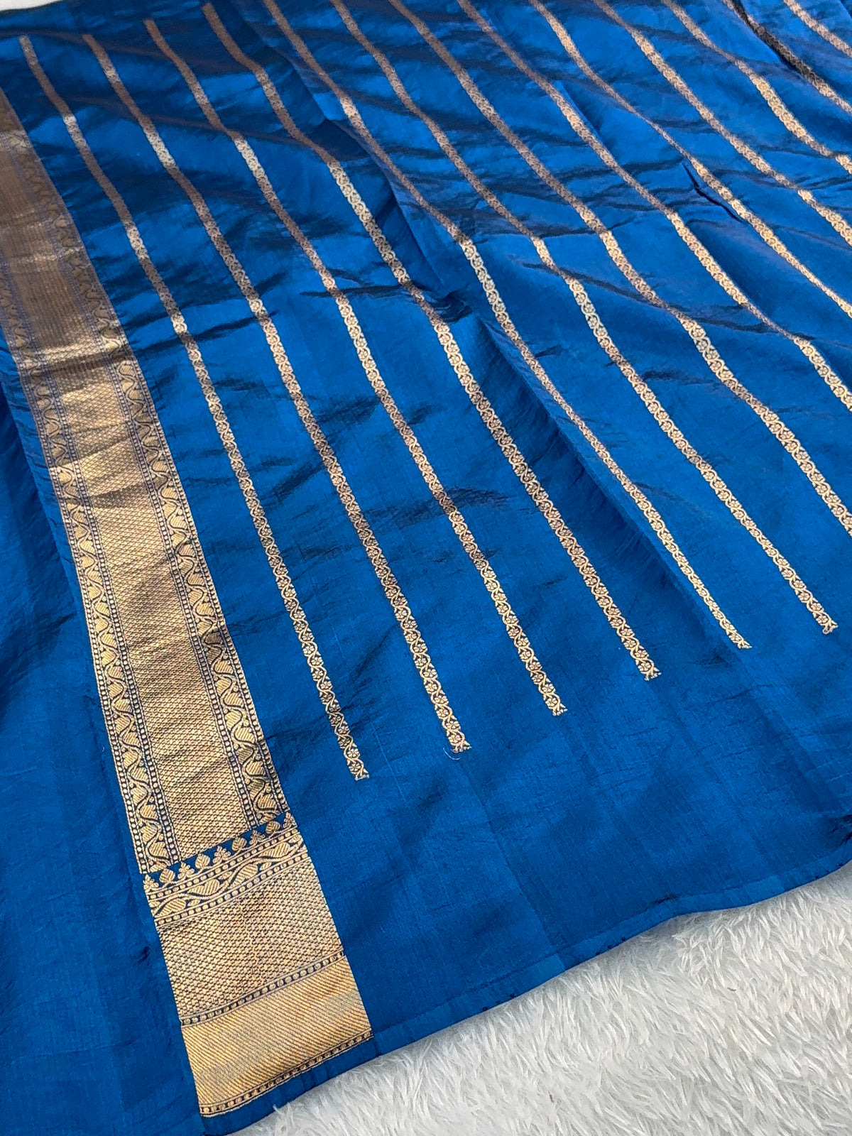 Banarasi Raw Mango Silk Saree in Border and Buta Design in Silver and Gold Zari work in German Blue Color