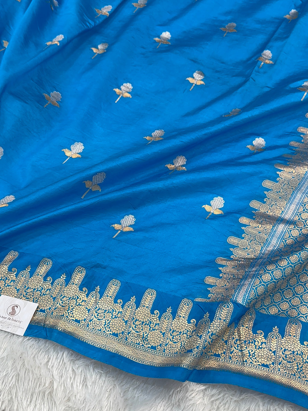 Banarasi Raw Mango Silk Saree in Border and Buta Design in Silver and Gold Zari work in Peacock Blue Color