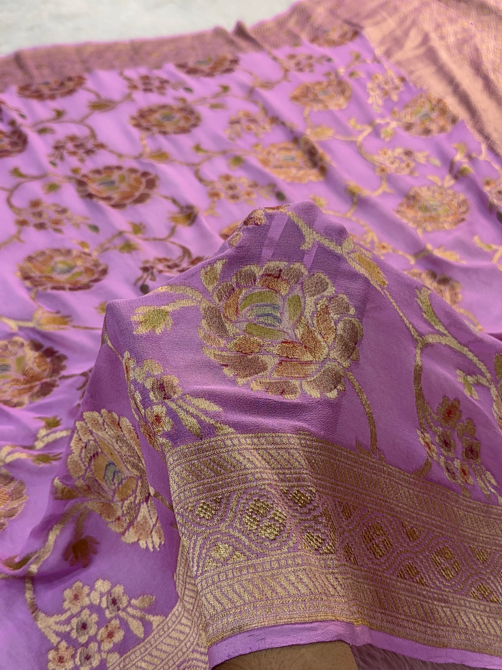 Banarasi Pure Khaddi Chiffon Saree  with Light Gold Zari Work In Floral Jaal Design with Meenakari by handbrush in Rusty Lavender Colour