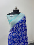 Banarasi Pure Khaddi Chiffon Saree  with Silver Zari Work In Floral Jaal Design in Royal Blue and Light Sea Green Colour Combination