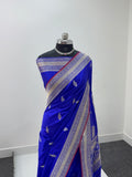 Handwoven pure katan silk saree with interlock weaving motifs in intricate silver and gold zari with Maroon Edge and Konia design in Royal Blue colour