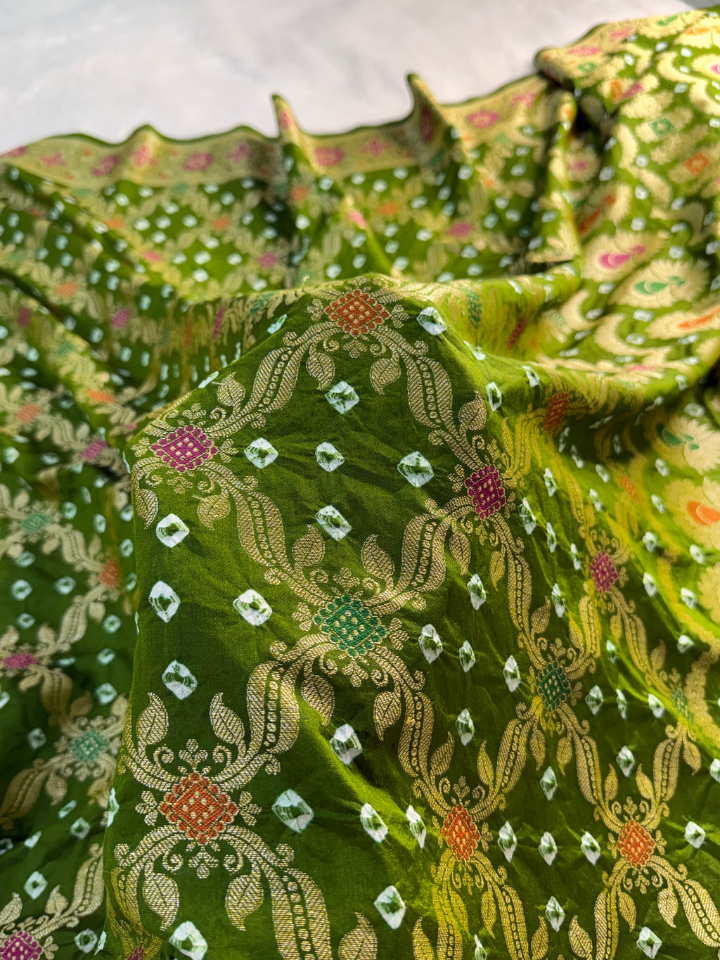 Banarasi Raw Silk Saree with Hand bandej all over in Jaal Design in Parrot Green Colour