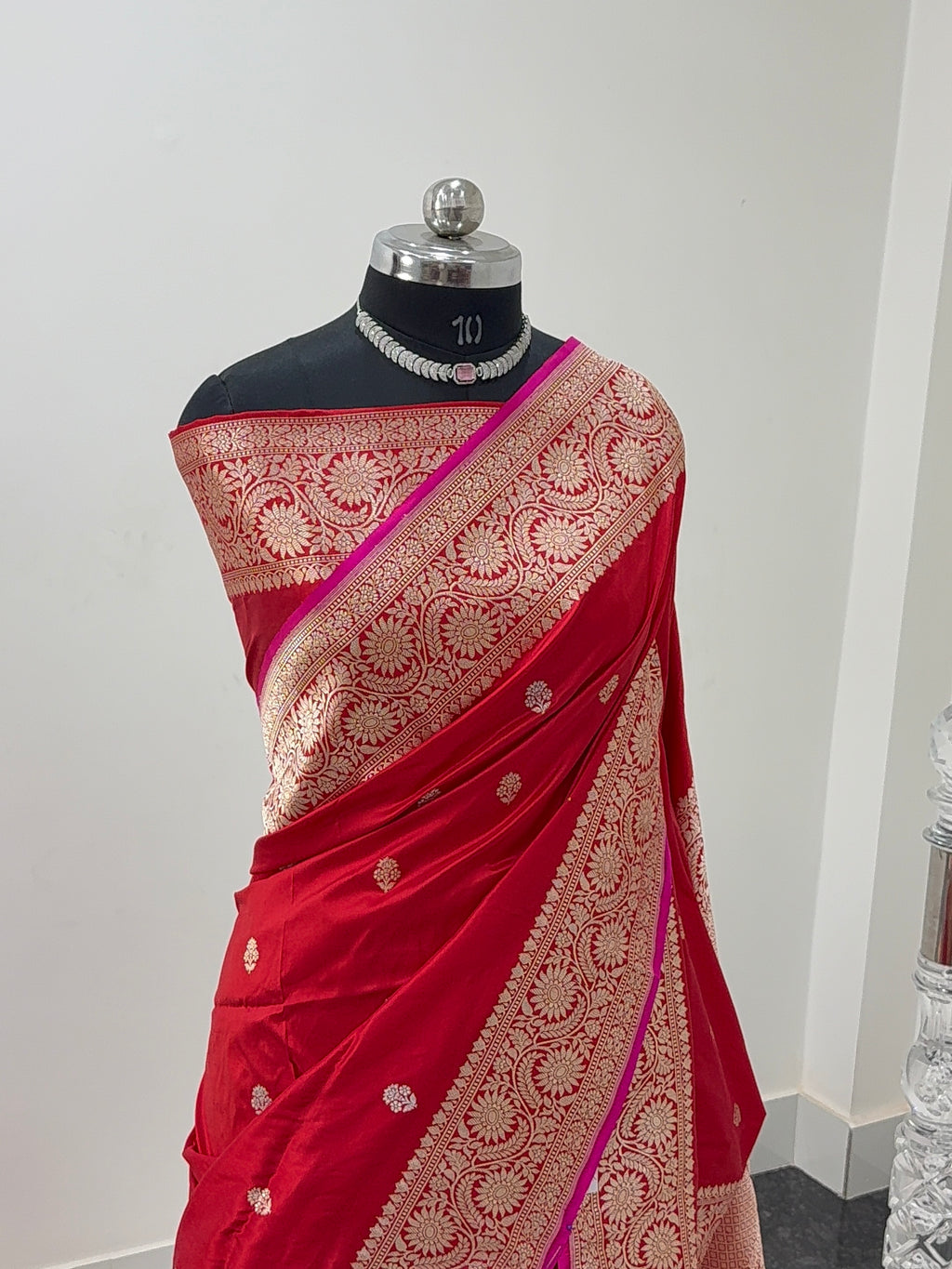 Handwoven pure katan silk saree in Red colour with interlock weaving motifs with intricate silver and gold zari with Rani Colour Edge