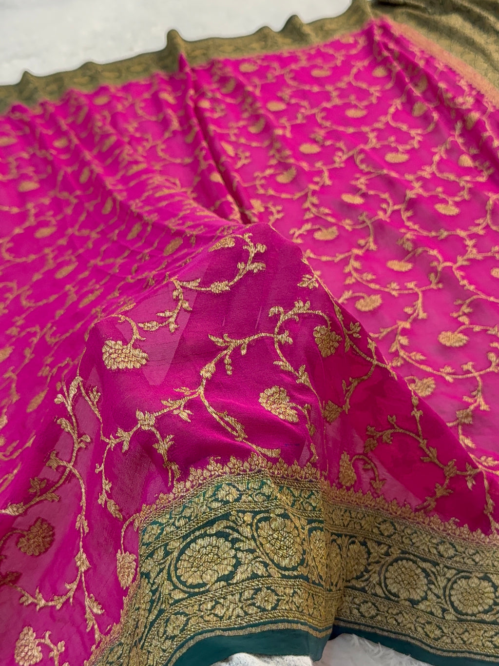 Banarasi Pure Khaddi Chiffon Saree  with Antique Zari Work In Floral Jaal Design in Shot Rani Colour