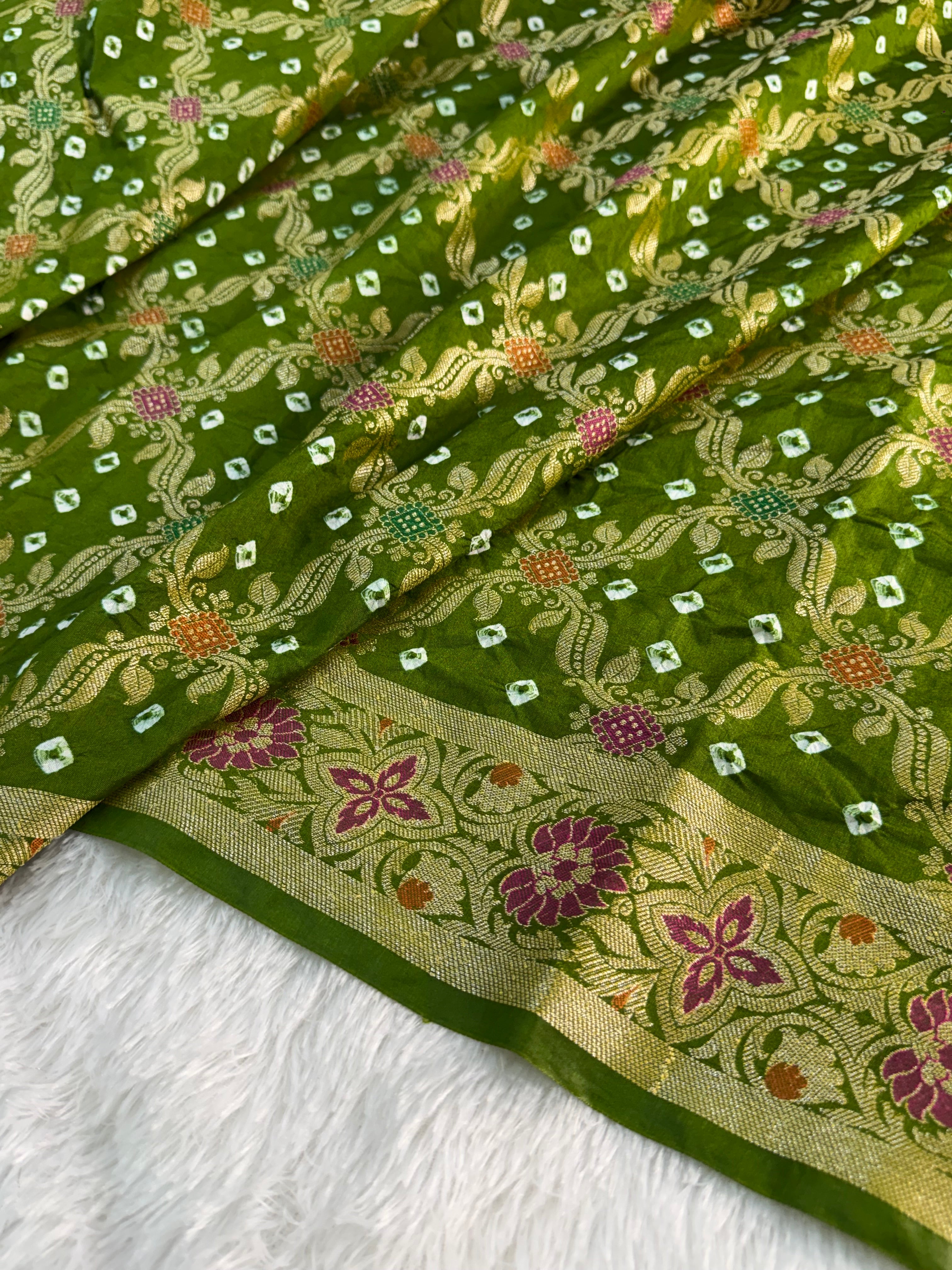 Banarasi Raw Silk Saree with Hand bandej all over in Jaal Design in Parrot Green Colour