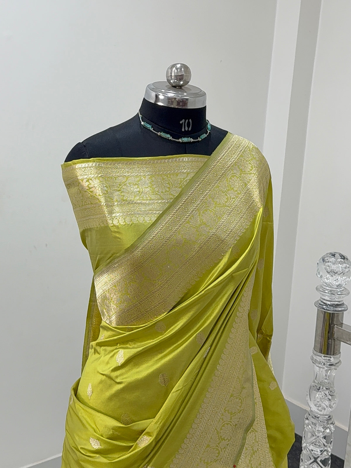 Handwoven pure katan silk saree with interlock weaving motifs with intricate silver zari in Neon Pista colour