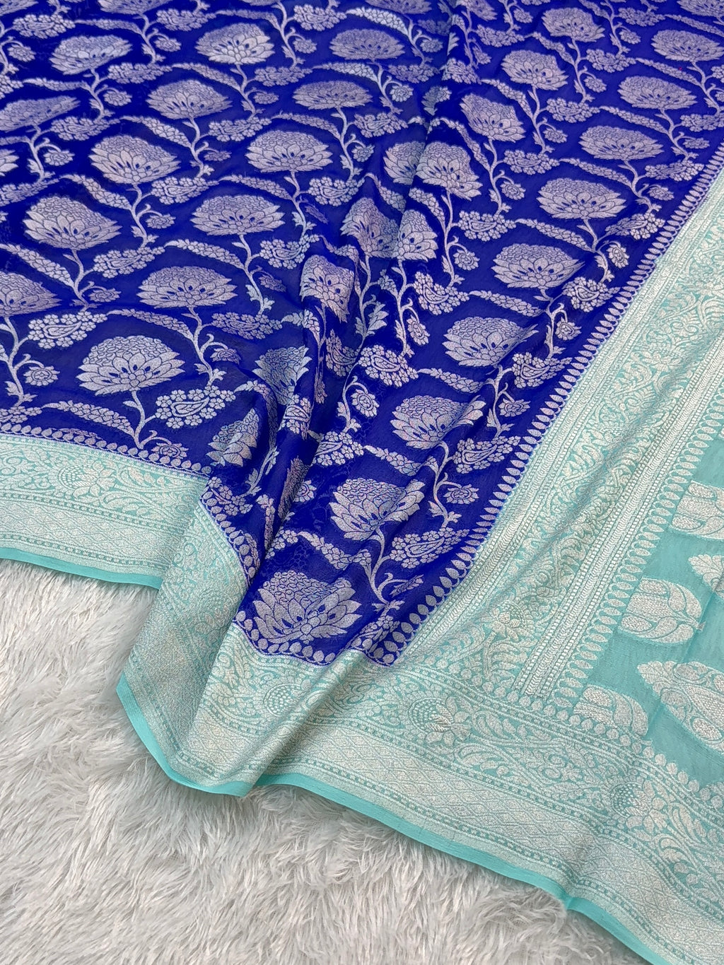 Banarasi Pure Khaddi Chiffon Saree  with Silver Zari Work In Floral Jaal Design in Royal Blue and Light Sea Green Colour Combination