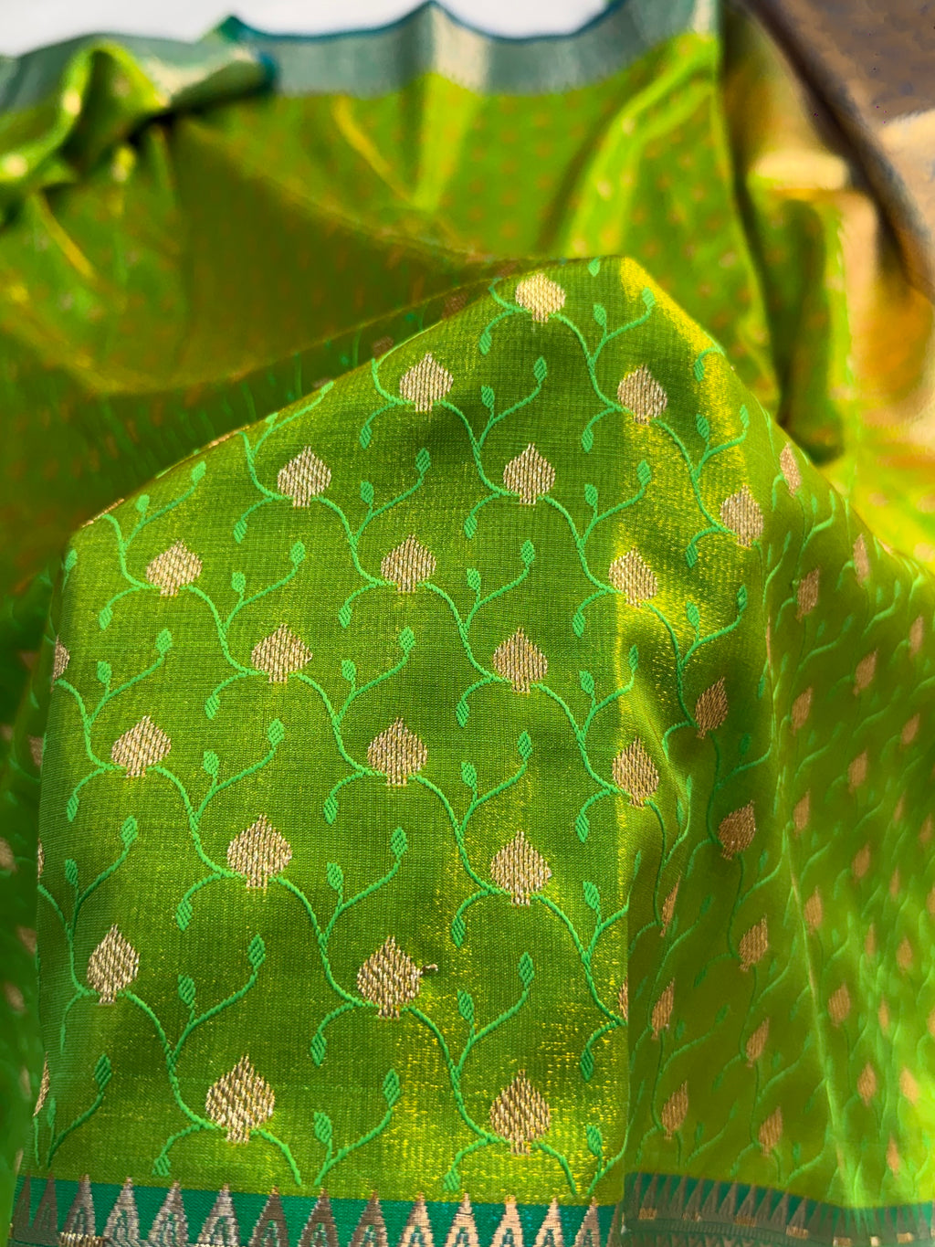 Banarasi satin silk saree in contrast Parrot green color with tanchoi design all over the body