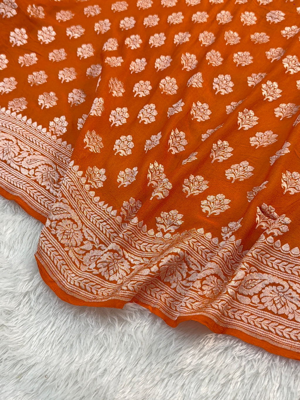 Banarasi Pure Khaddi Chiffon Saree  with Light Gold Zari Work In Floral Motifs Design in Orange Colour