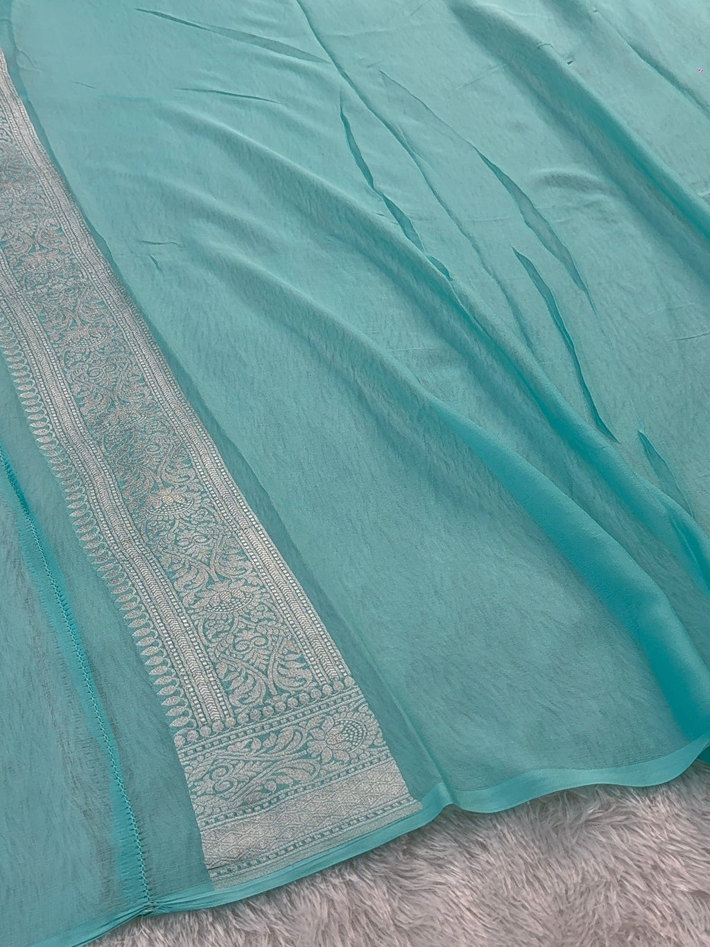 Banarasi Pure Khaddi Chiffon Saree  with Silver Zari Work In Floral Jaal Design in Royal Blue and Light Sea Green Colour Combination