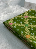 Banarasi Raw Silk Saree with Hand bandej all over in Jaal Design in Parrot Green Colour