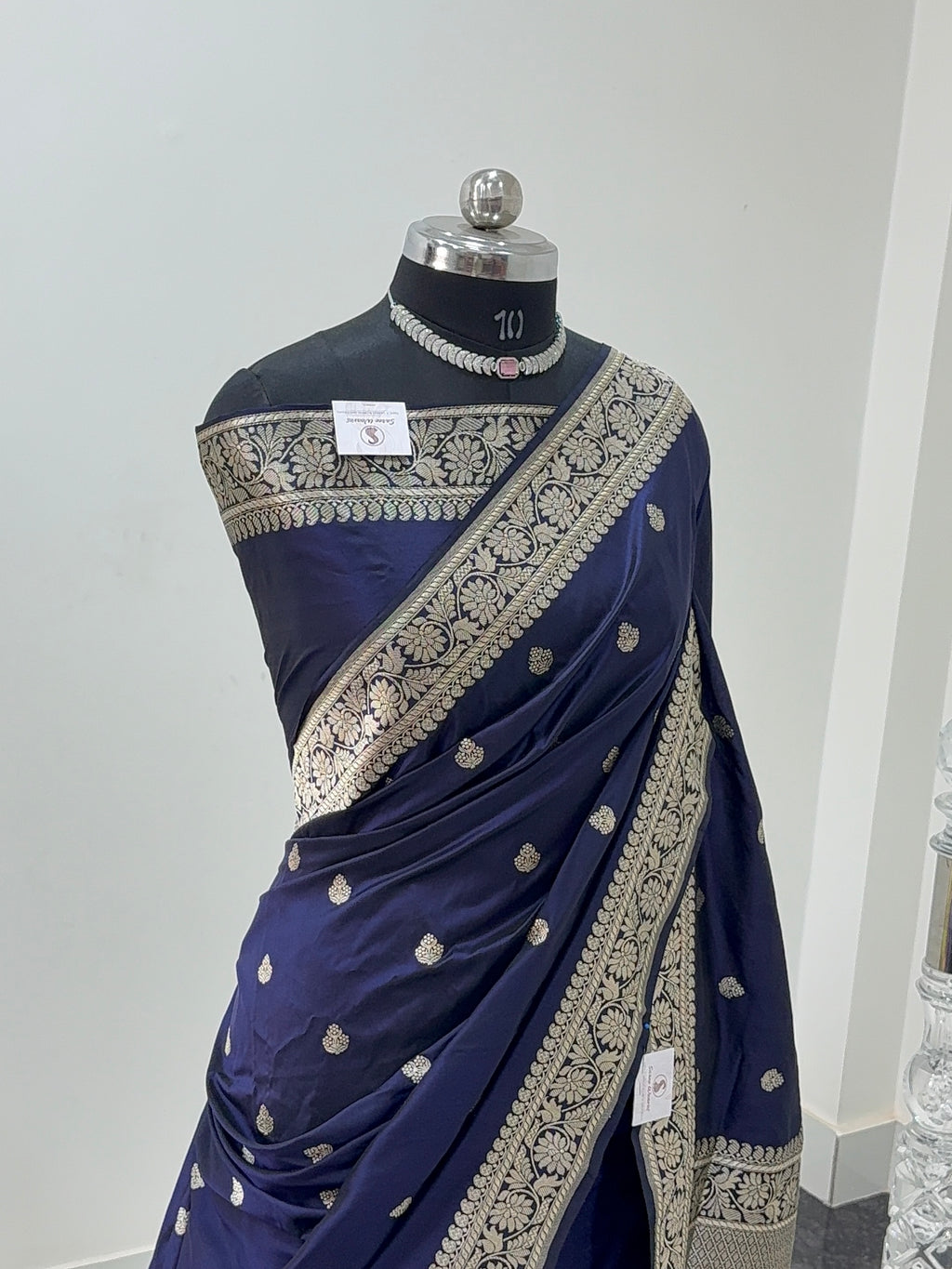 Handwoven pure katan silk saree with interlock weaving motifs in Light gold zari in Navy Blue Colour