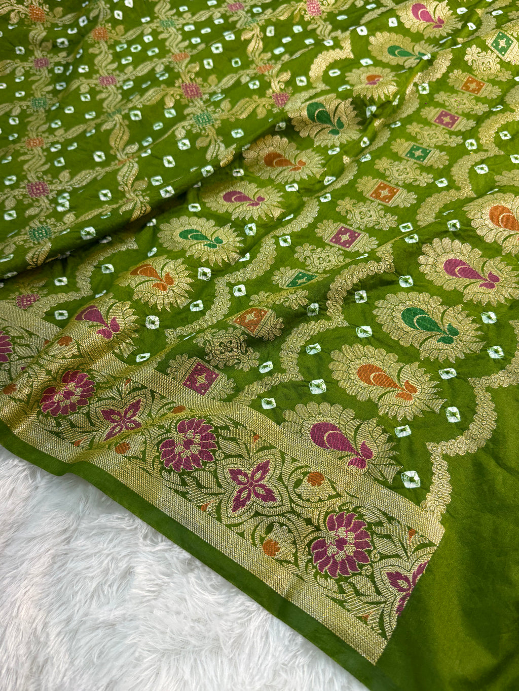 Banarasi Raw Silk Saree with Hand bandej all over in Jaal Design in Parrot Green Colour