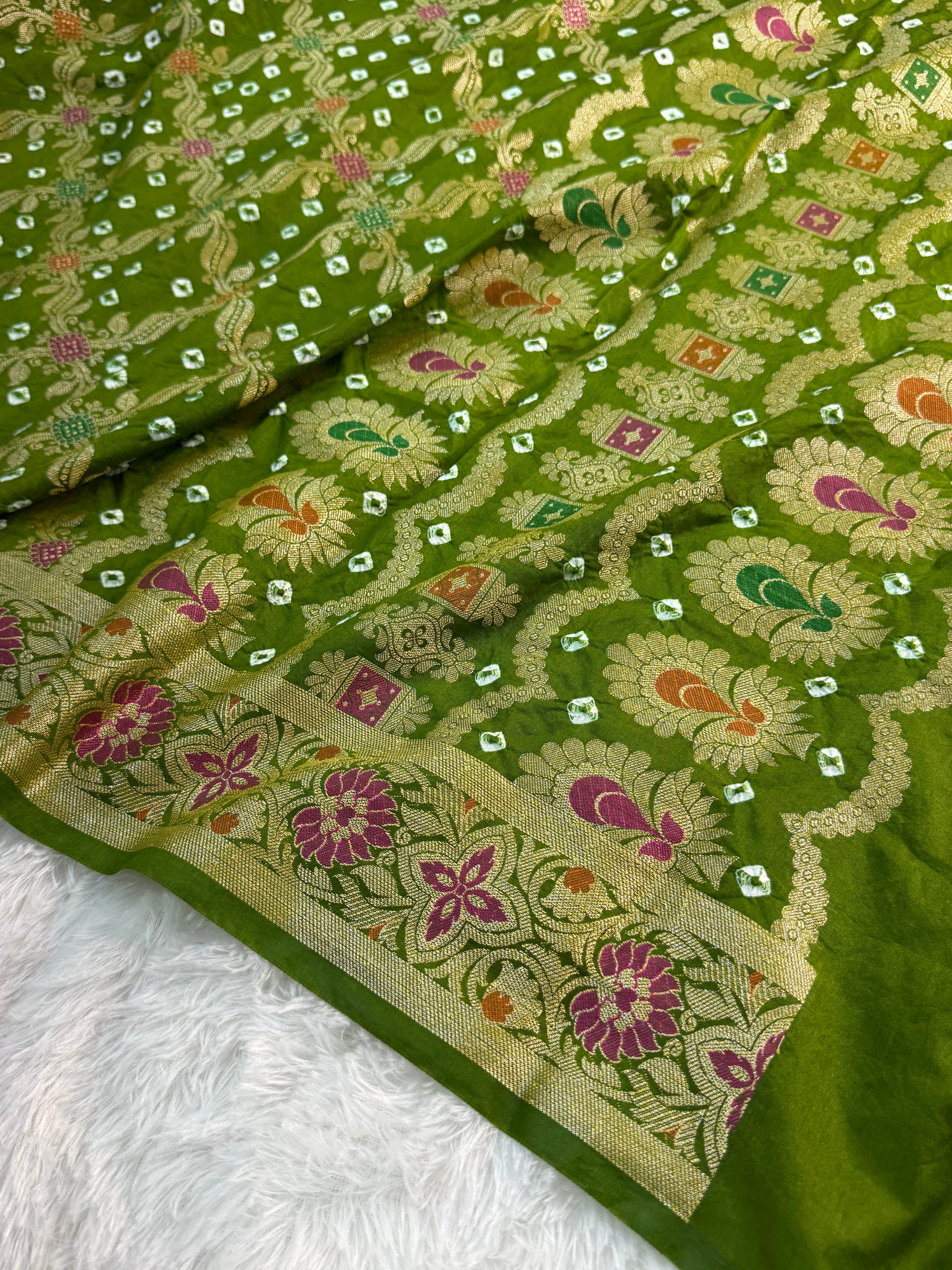Banarasi Raw Silk Saree with Hand bandej all over in Jaal Design in Parrot Green Colour