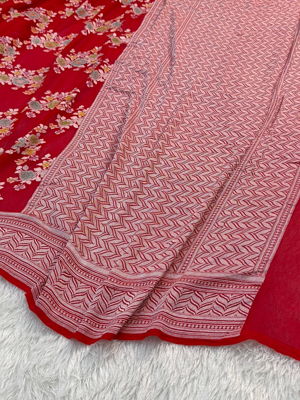 Banarasi Pure Khaddi Chiffon Saree  with Silver Zari Work In Floral Jaal Design with Meenakari by handbrush in Light Red Colour