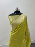 Handwoven pure katan silk saree with interlock weaving motifs with intricate silver zari in Neon Pista colour