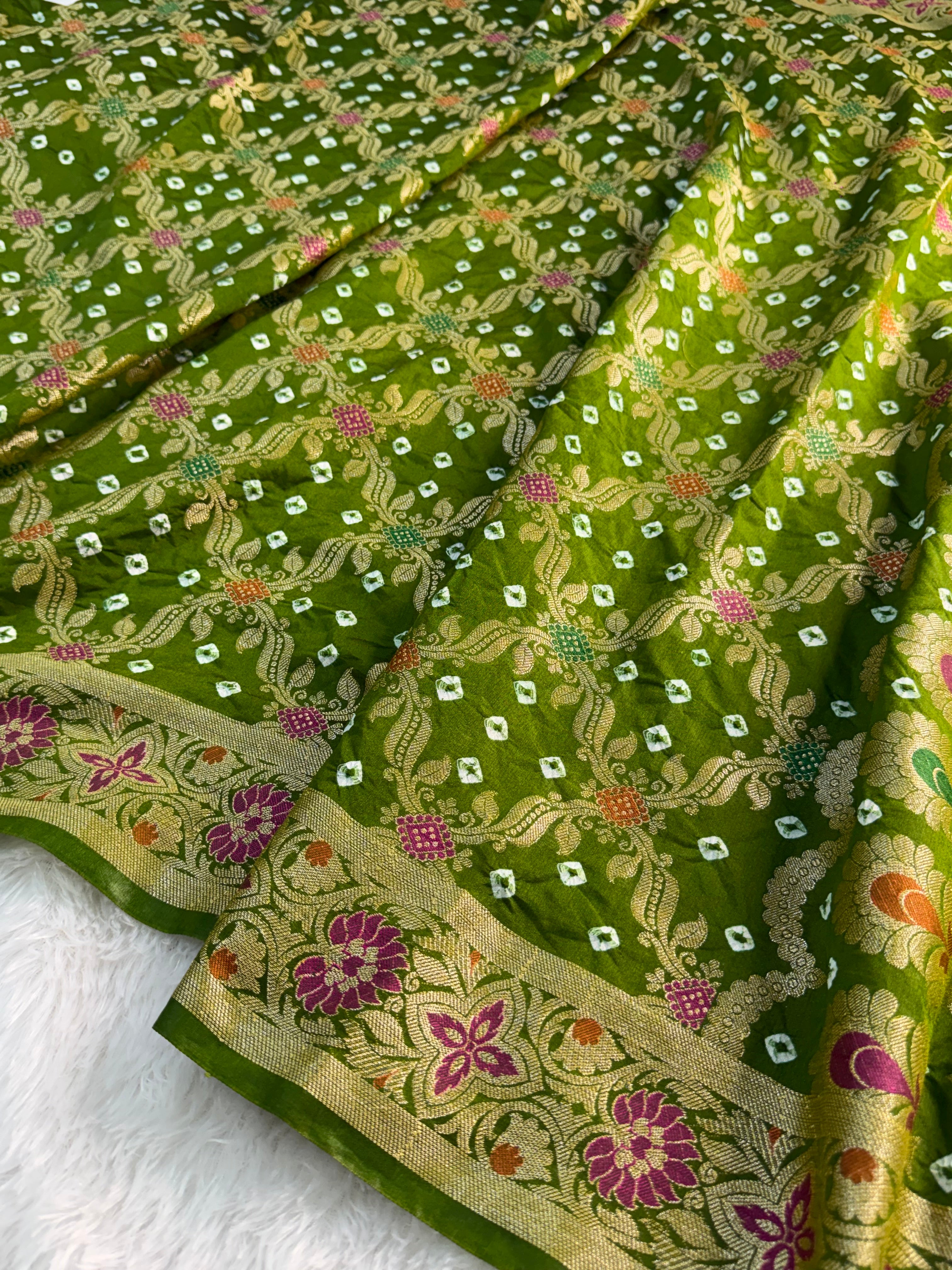 Banarasi Raw Silk Saree with Hand bandej all over in Jaal Design in Parrot Green Colour