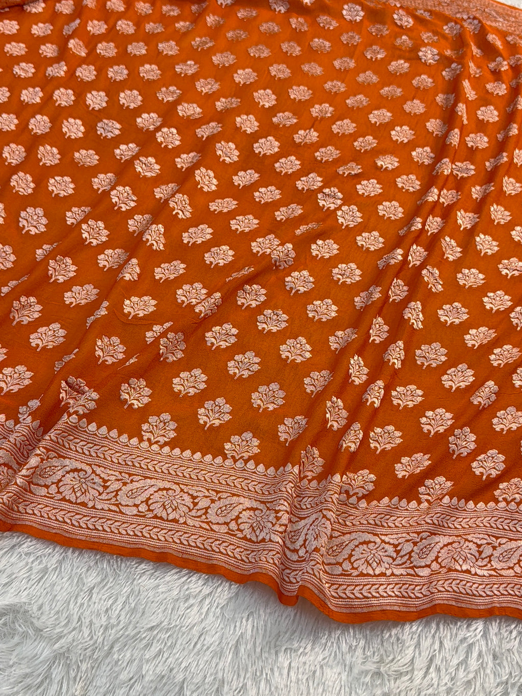 Banarasi Pure Khaddi Chiffon Saree  with Light Gold Zari Work In Floral Motifs Design in Orange Colour