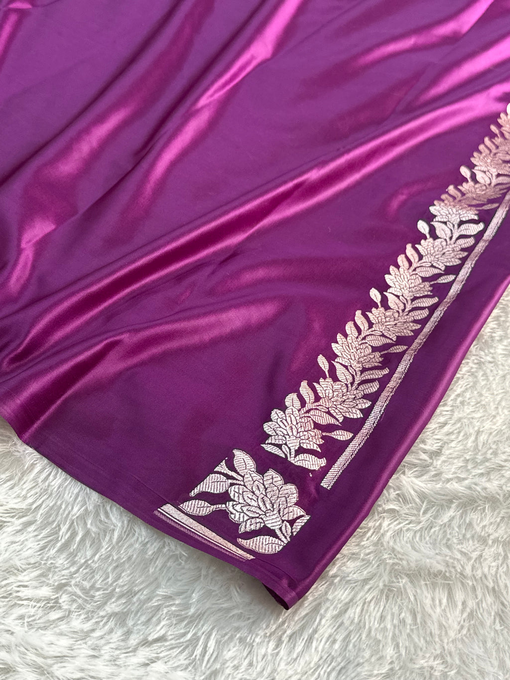 Banarasi Mashru Silk Saree with plain body and floral border Design in Majenta colour