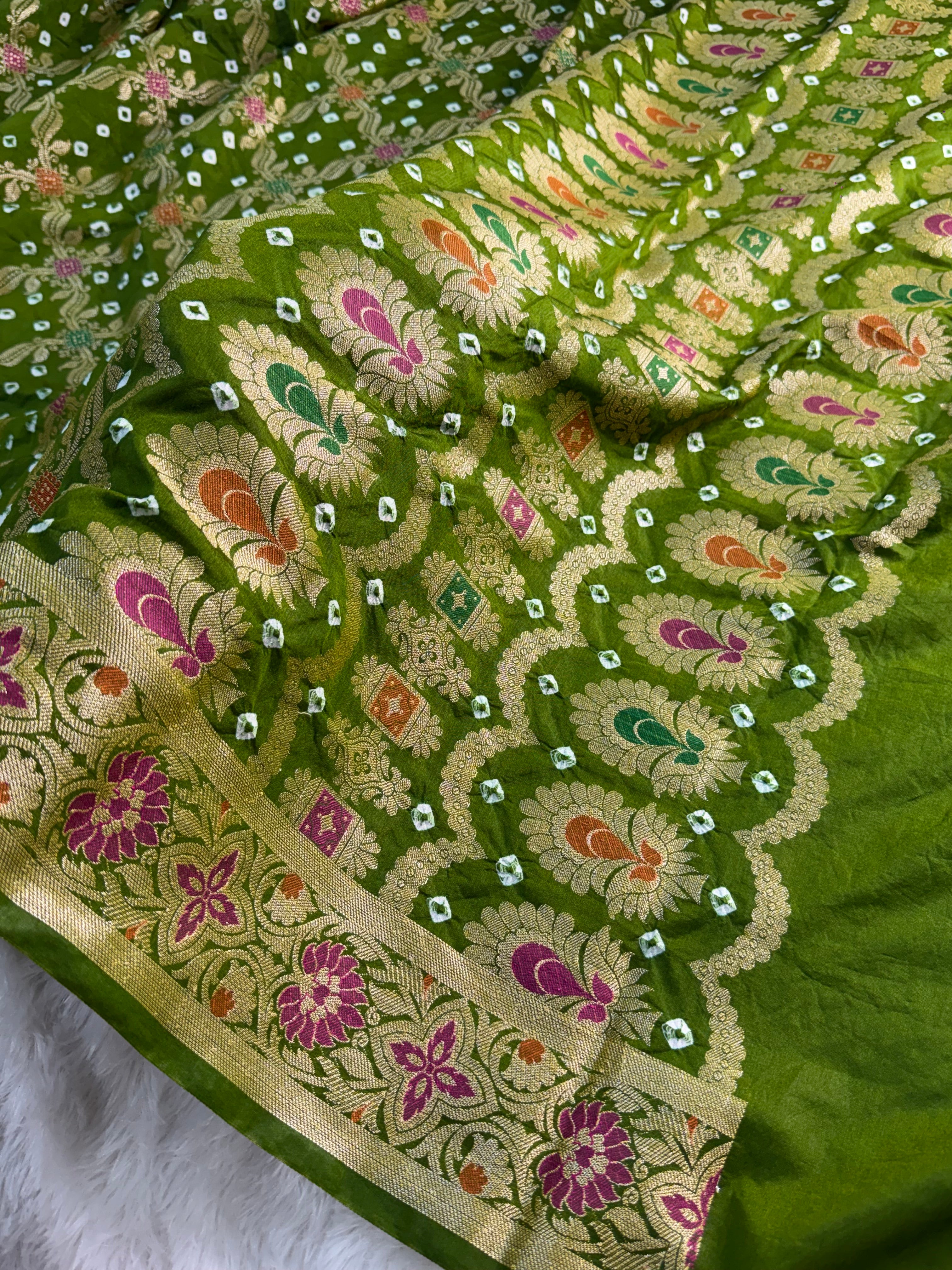 Banarasi Raw Silk Saree with Hand bandej all over in Jaal Design in Parrot Green Colour