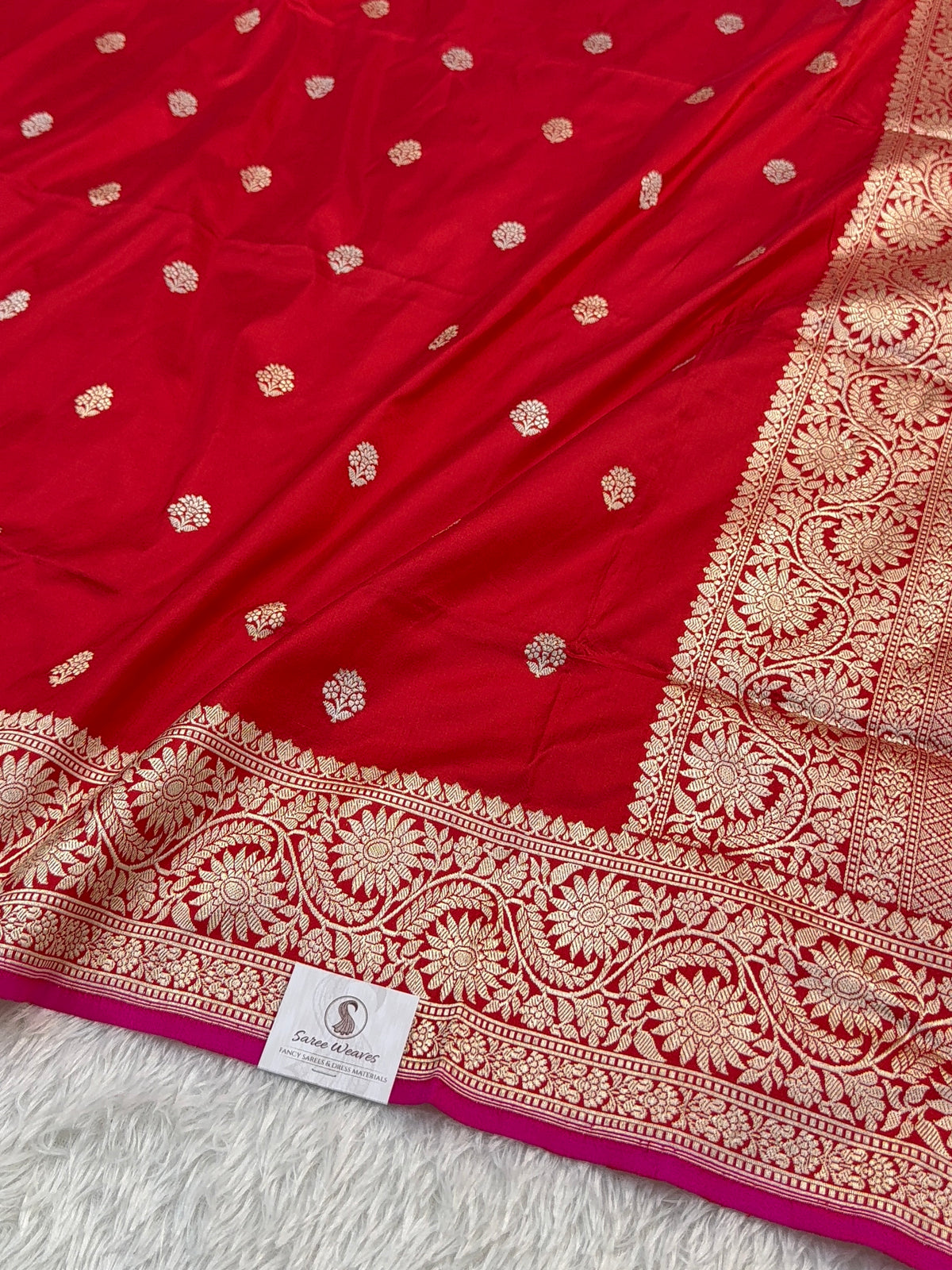 Handwoven pure katan silk saree in Red colour with interlock weaving motifs with intricate silver and gold zari with Rani Colour Edge