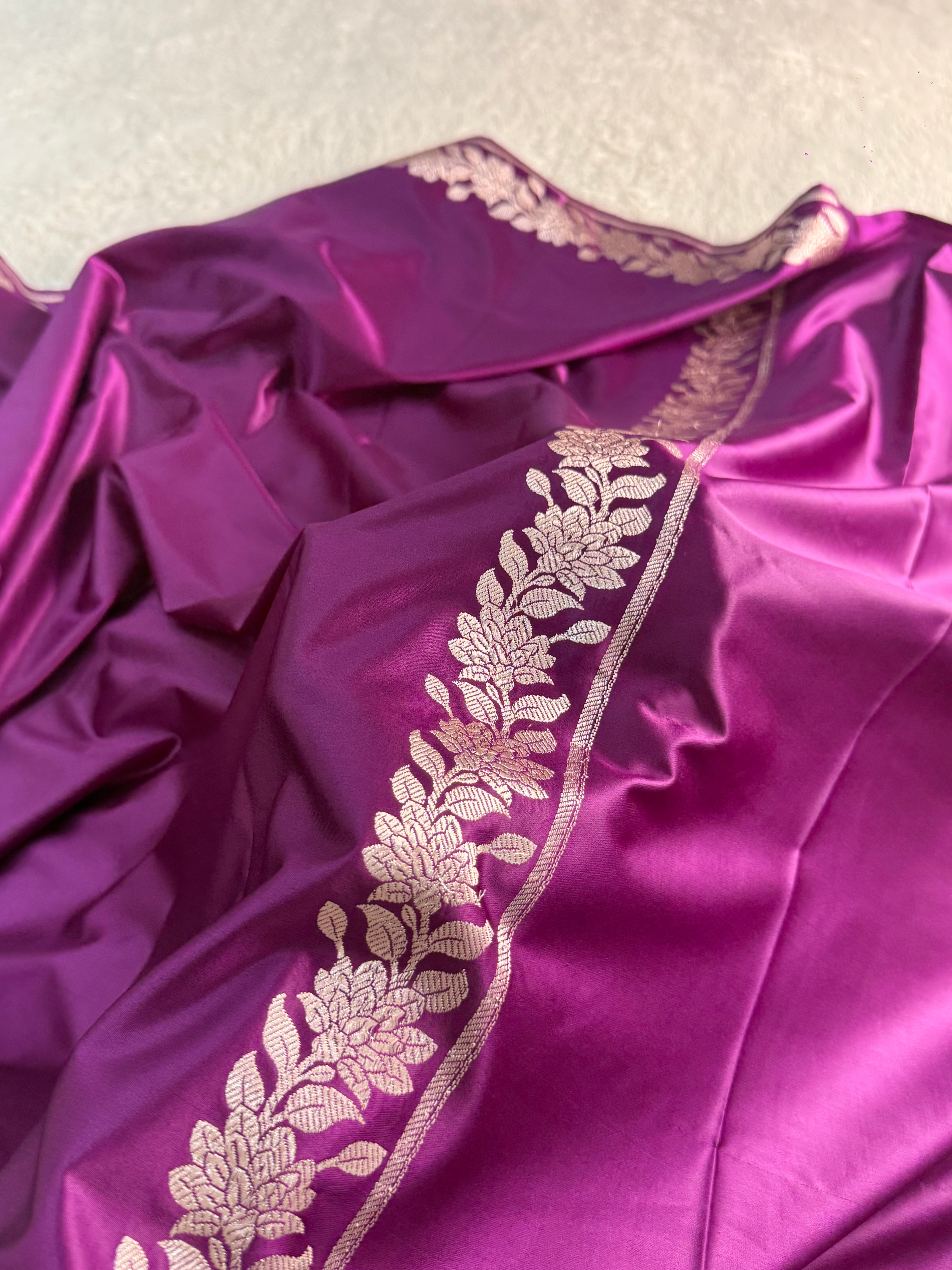 Banarasi Mashru Silk Saree with plain body and floral border Design in Majenta colour