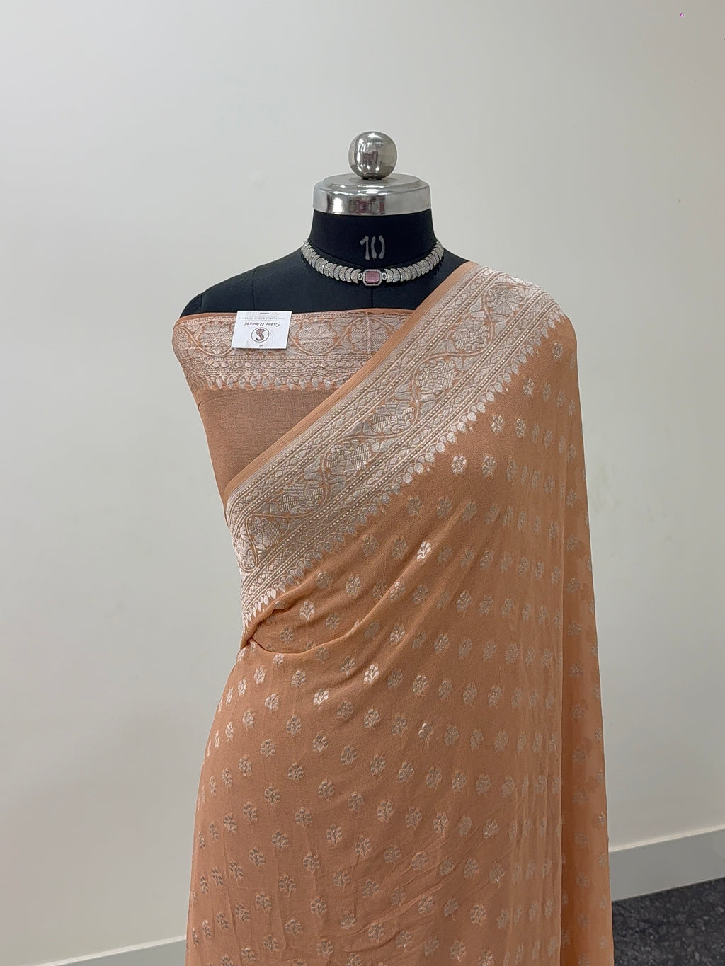 Banarasi Pure Khaddi Chiffon Saree  with Silver Zari Work with Small Motifs Pattern Design in Peach Colour