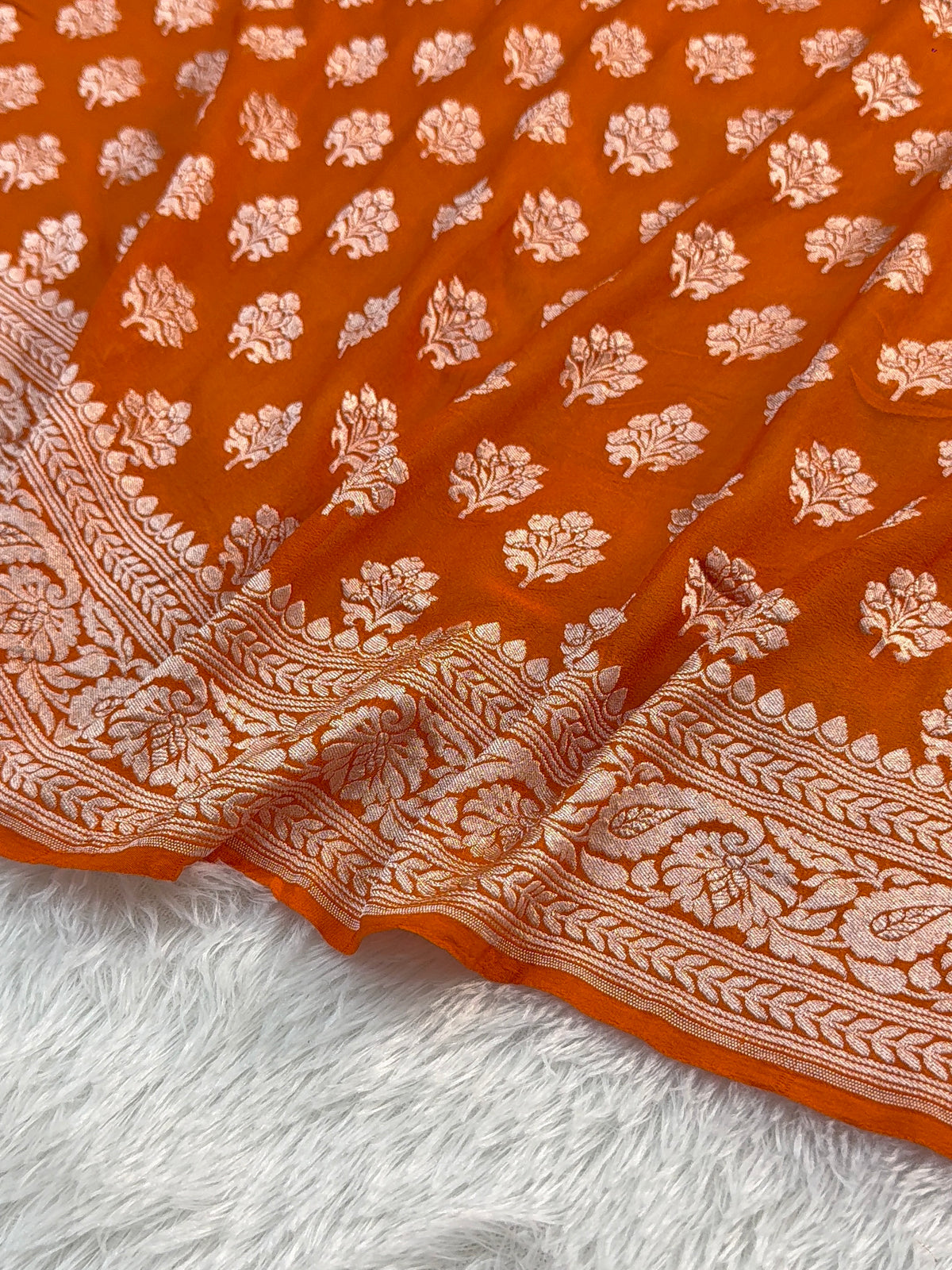 Banarasi Pure Khaddi Chiffon Saree  with Light Gold Zari Work In Floral Motifs Design in Orange Colour