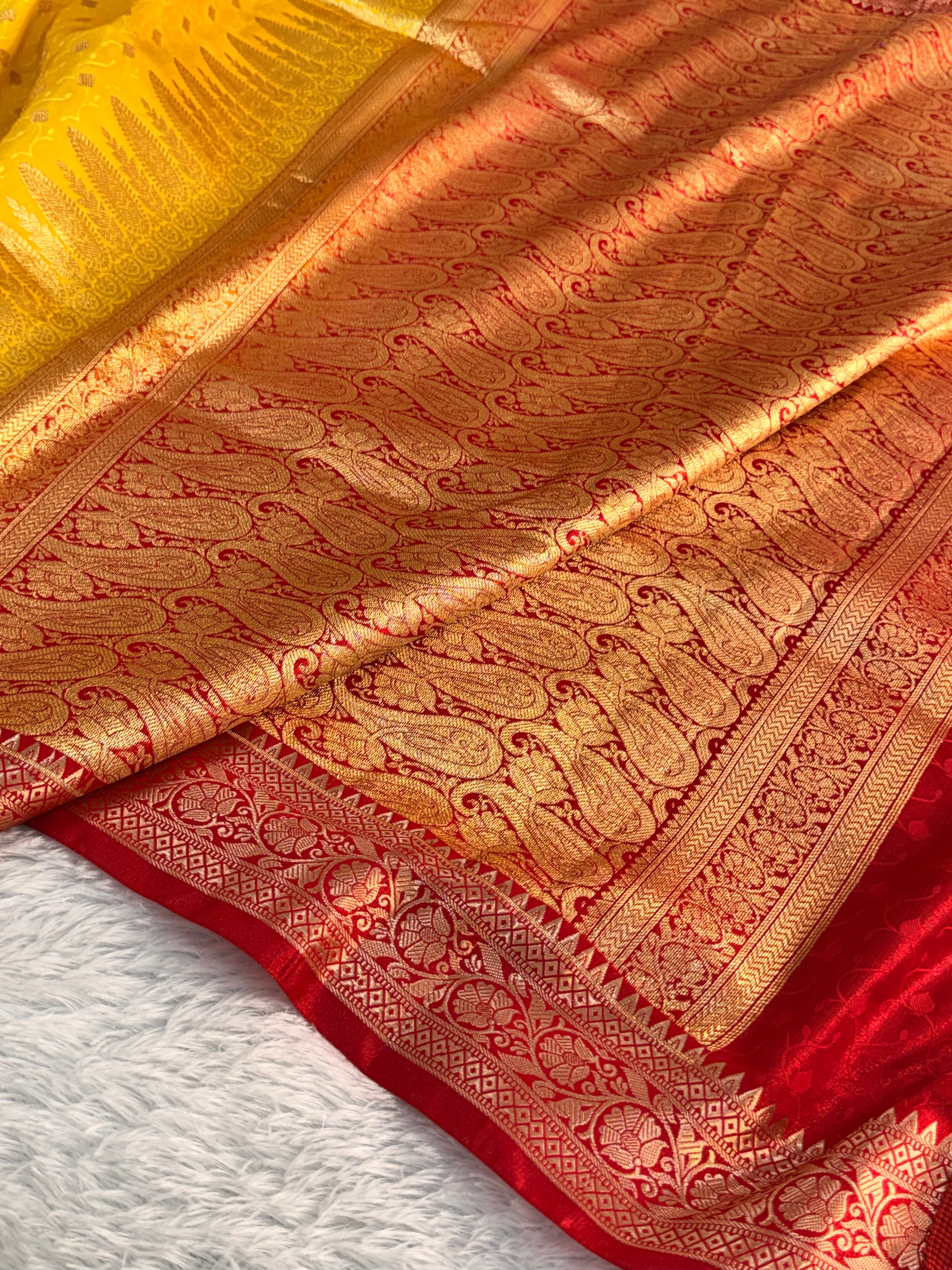 Banarasi satin silk saree in yellow color with tanchoi design all over the body