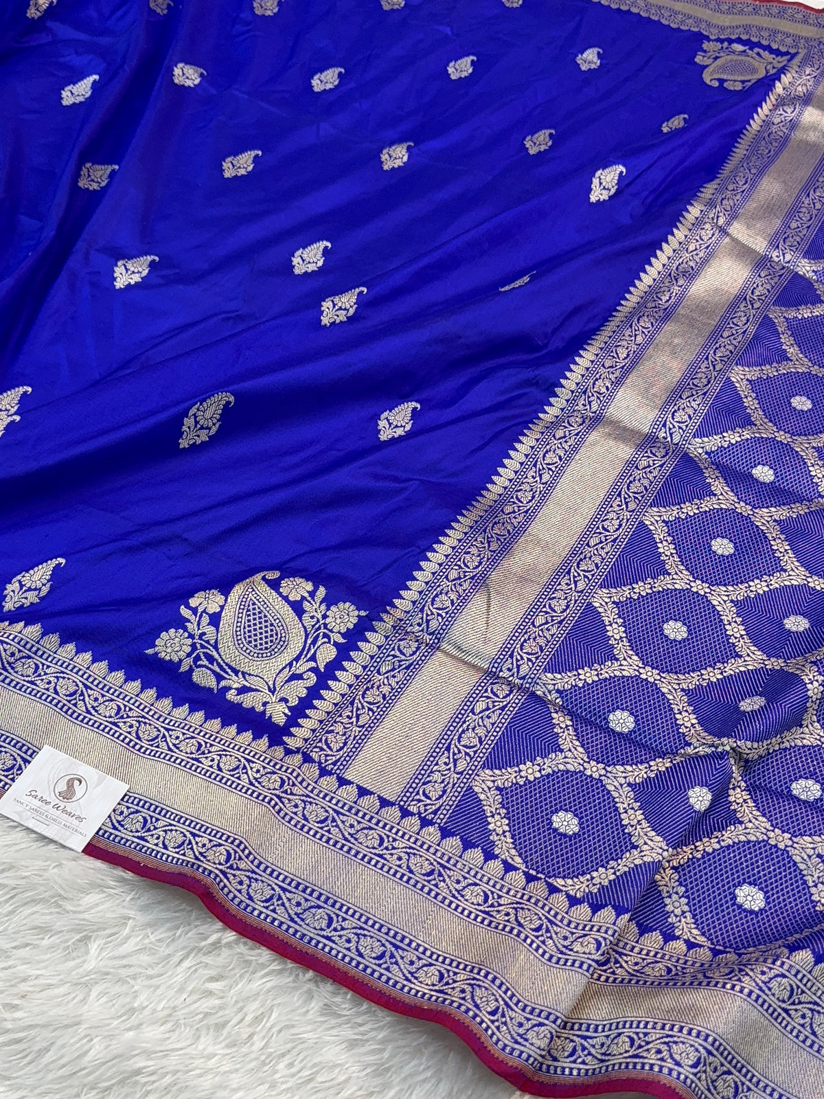Handwoven pure katan silk saree with interlock weaving motifs in intricate silver and gold zari with Maroon Edge and Konia design in Royal Blue colour