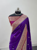 Handwoven pure katan silk saree with interlock weaving motifs in intricate silver and gold zari with Contrast of Deep Violet and Shot Rani Colour