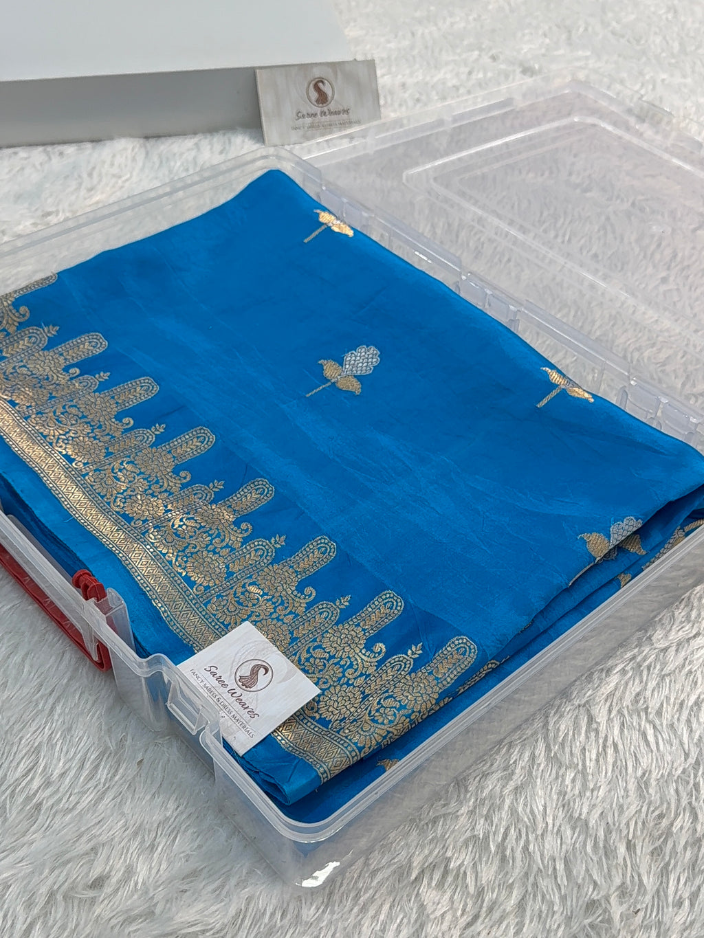 Banarasi Raw Mango Silk Saree in Border and Buta Design in Silver and Gold Zari work in Peacock Blue Color