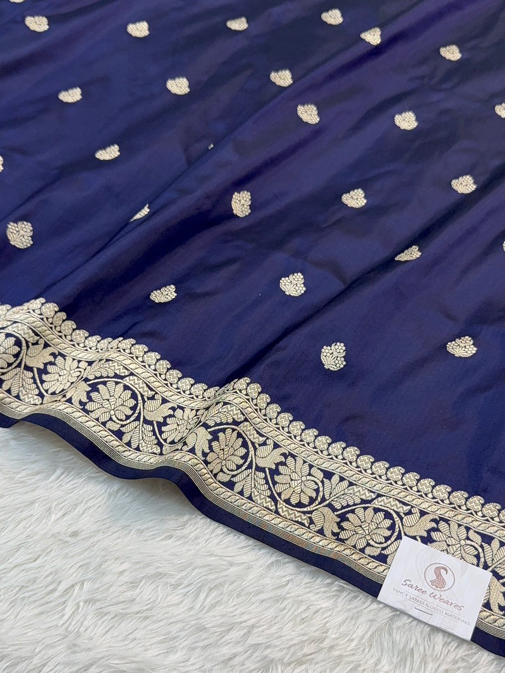 Handwoven pure katan silk saree with interlock weaving motifs in Light gold zari in Navy Blue Colour