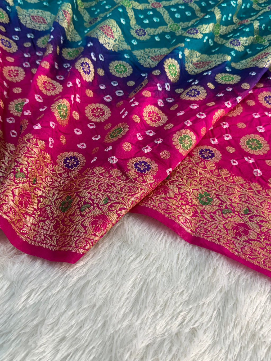 Banarasi Raw Silk Saree with Hand bandej all over in Motifs Design in Rani and Bottle Green Colour