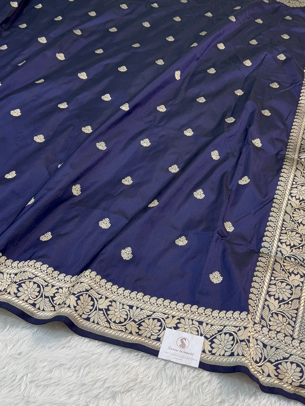 Handwoven pure katan silk saree with interlock weaving motifs in Light gold zari in Navy Blue Colour