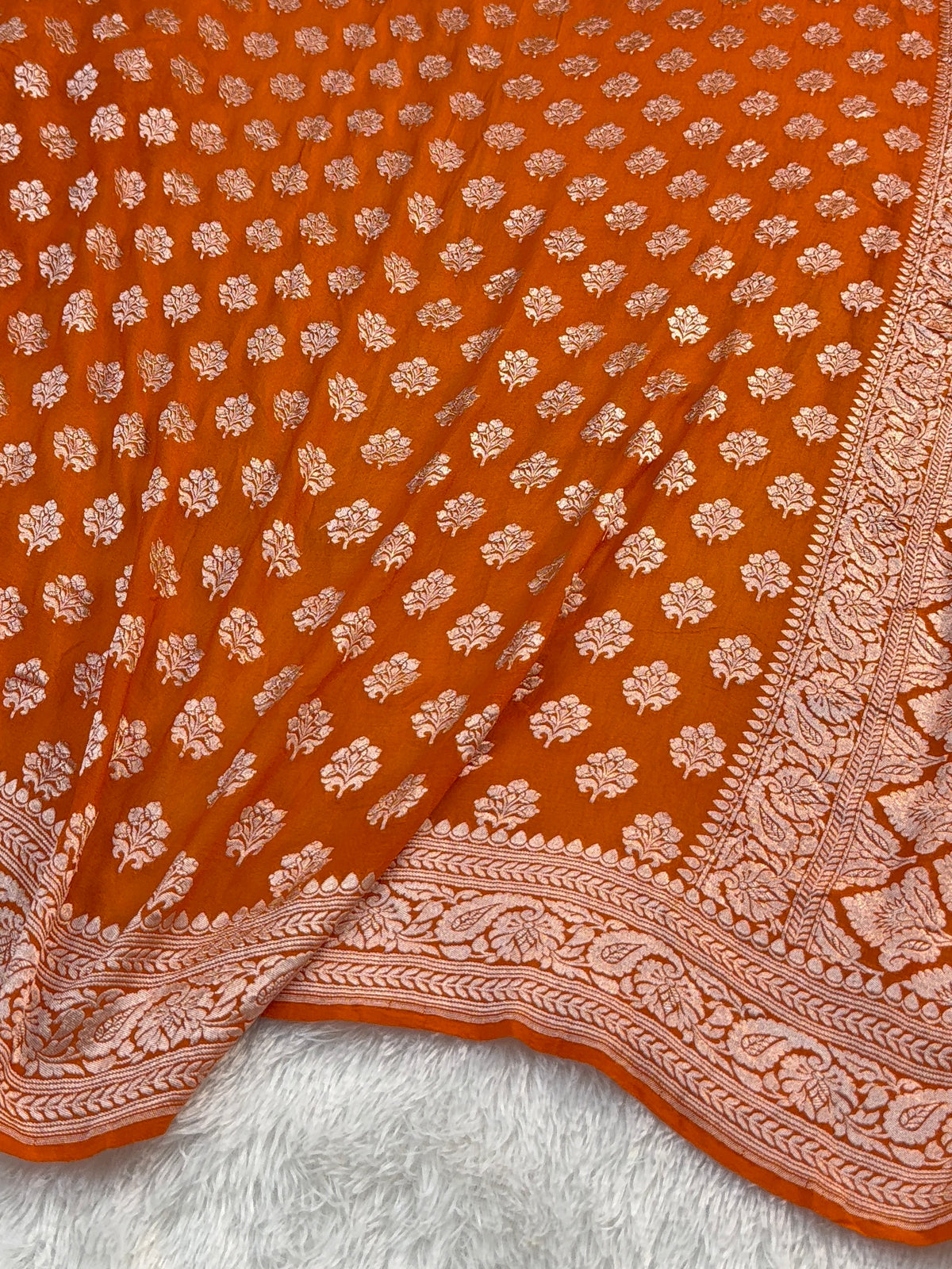 Banarasi Pure Khaddi Chiffon Saree  with Light Gold Zari Work In Floral Motifs Design in Orange Colour