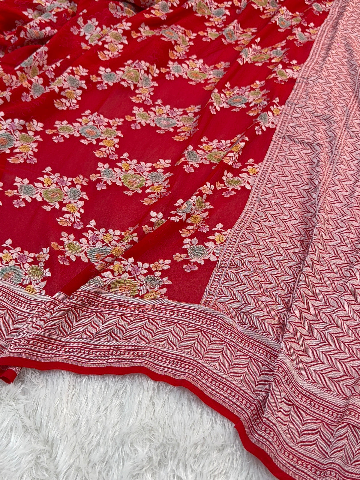 Banarasi Pure Khaddi Chiffon Saree  with Silver Zari Work In Floral Jaal Design with Meenakari by handbrush in Light Red Colour
