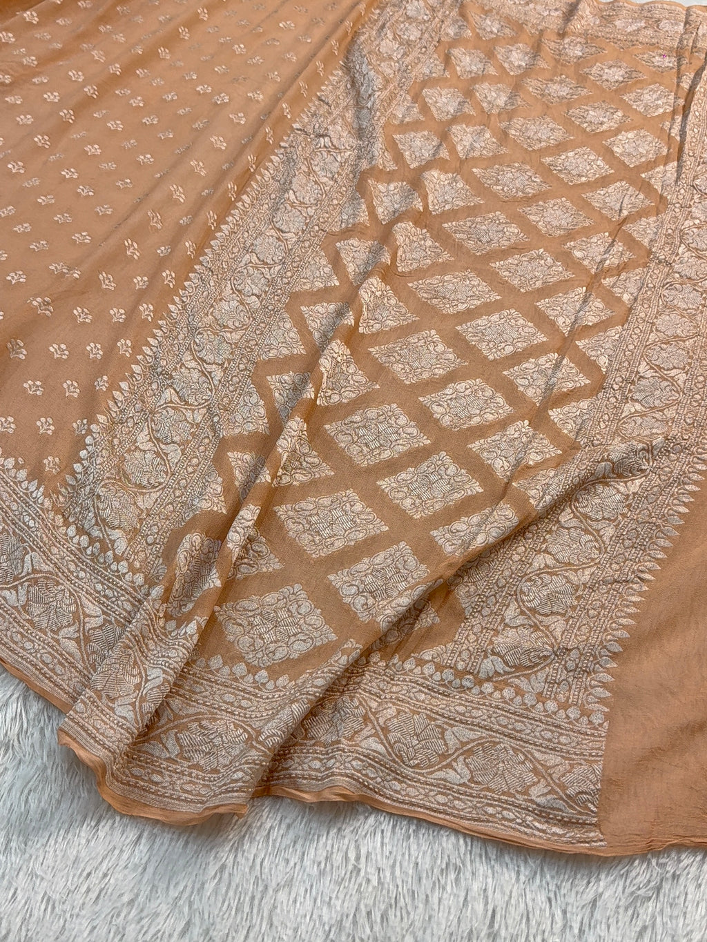 Banarasi Pure Khaddi Chiffon Saree  with Silver Zari Work with Small Motifs Pattern Design in Peach Colour