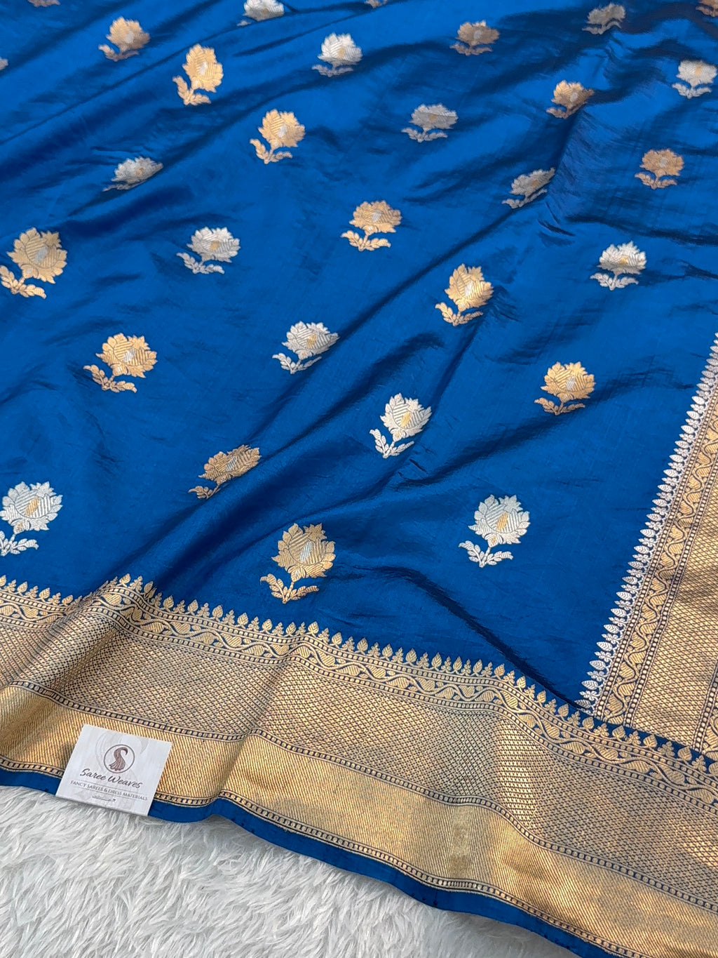 Banarasi Raw Mango Silk Saree in Border and Buta Design in Silver and Gold Zari work in German Blue Color