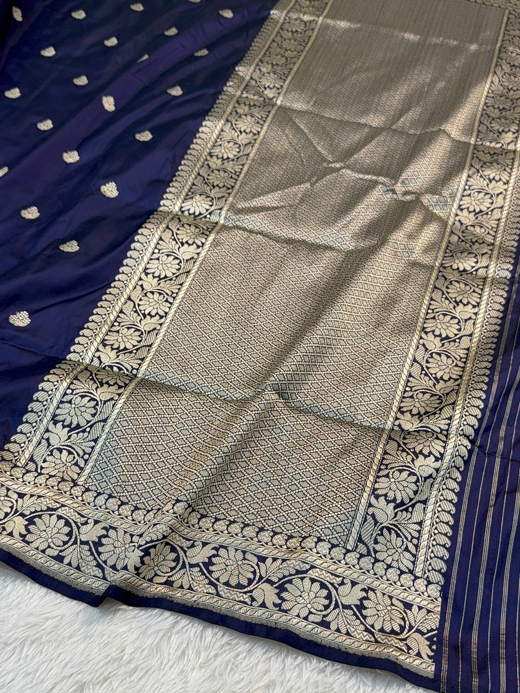 Handwoven pure katan silk saree with interlock weaving motifs in Light gold zari in Navy Blue Colour
