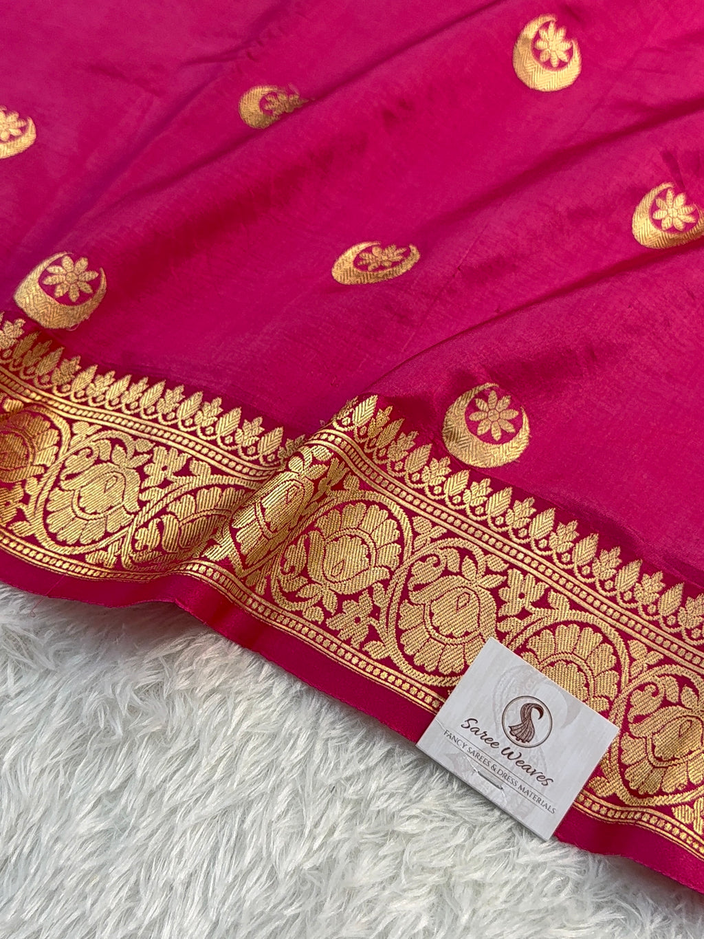 Banarasi Raw Mango Silk Saree in Chand Tara Design in Rani Color