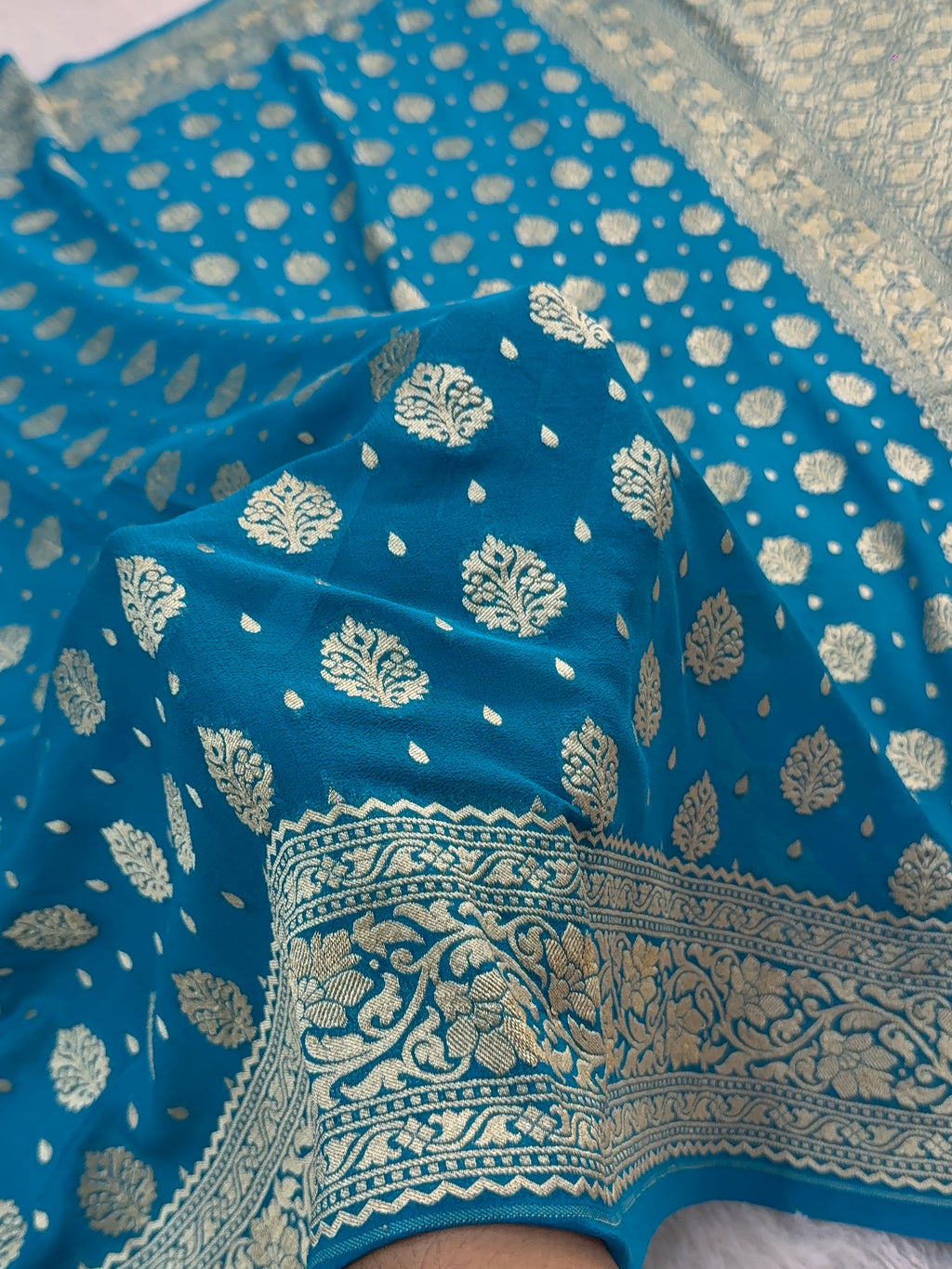 Banarasi Pure Khaddi Chiffon Saree in Buta and Buti Design in Peacock Blue Colour