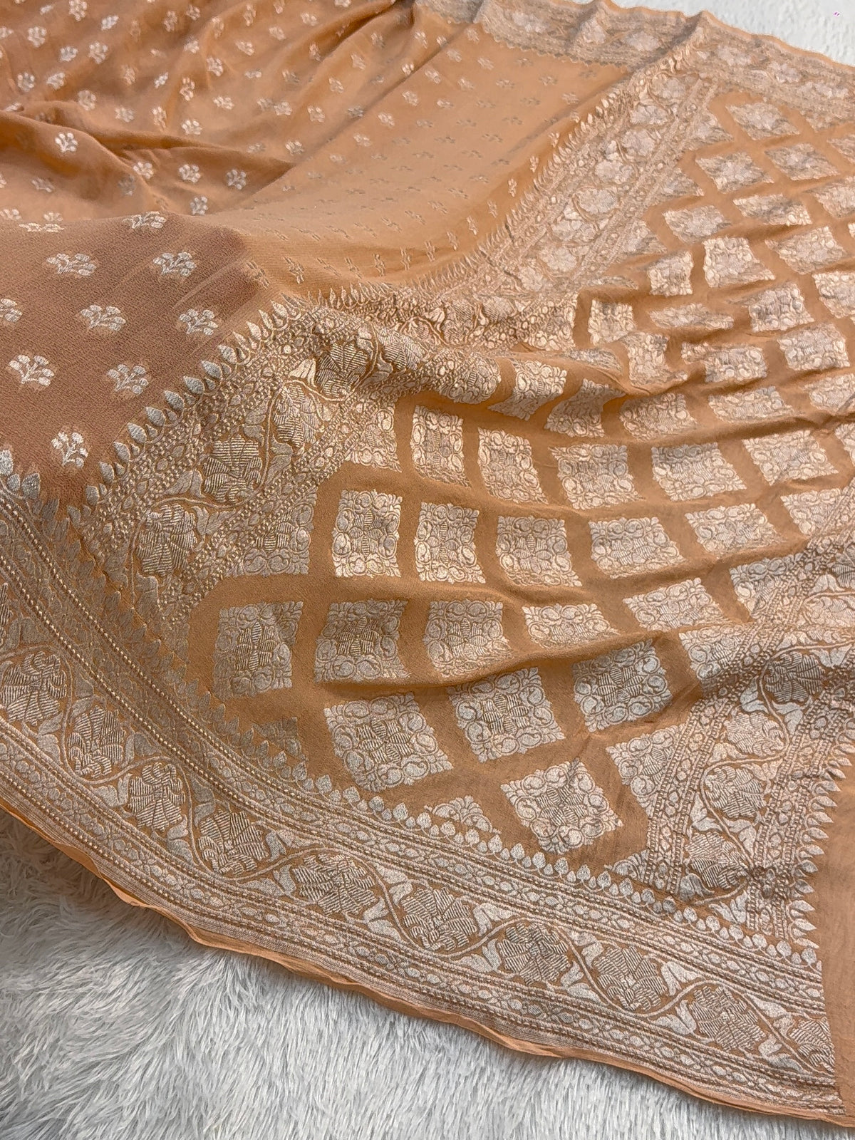 Banarasi Pure Khaddi Chiffon Saree  with Silver Zari Work with Small Motifs Pattern Design in Peach Colour
