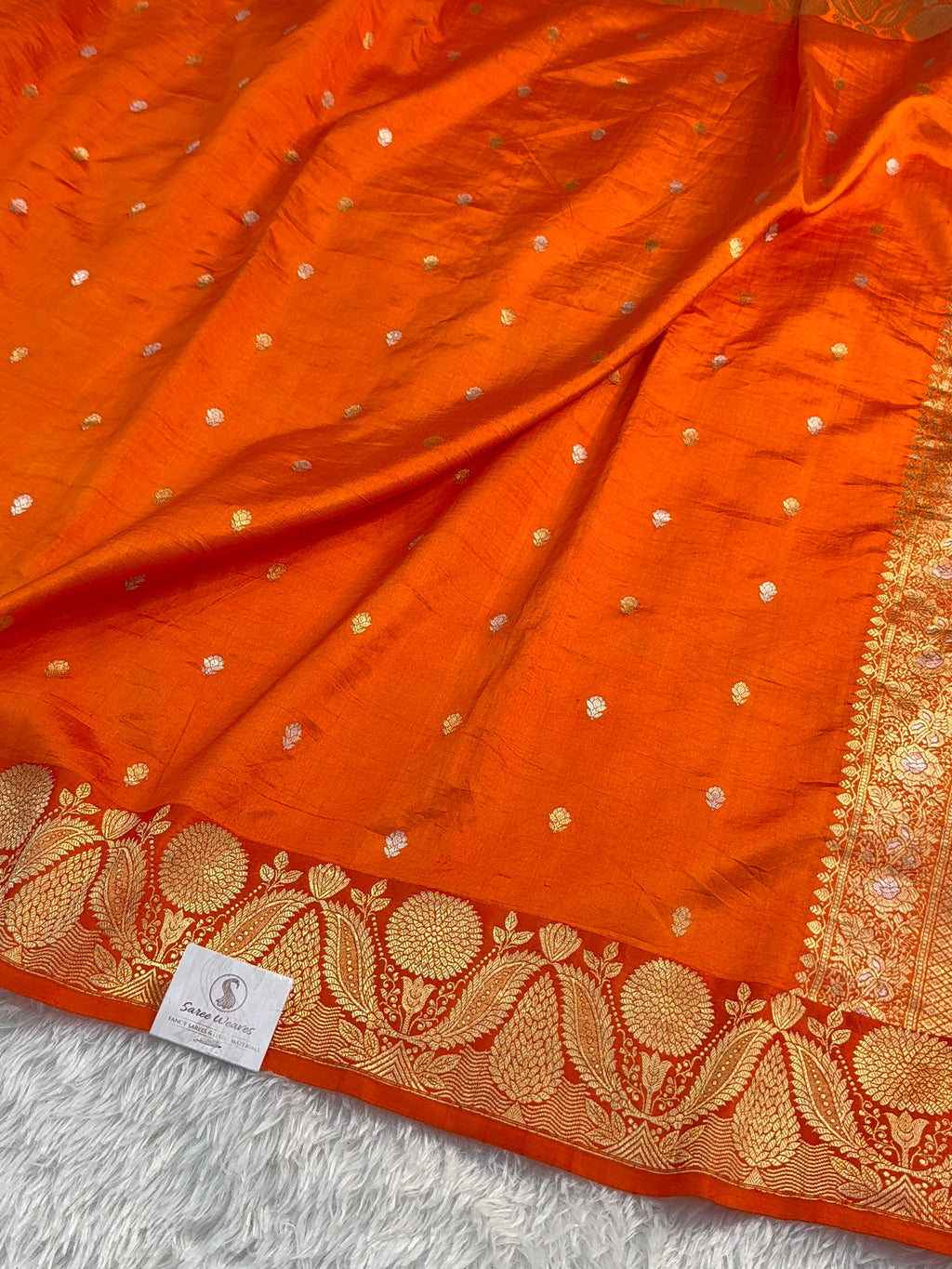 Banarasi Raw Mango Silk Saree in Border and Buti Design in Silver and Gold Zari work in a orange Color