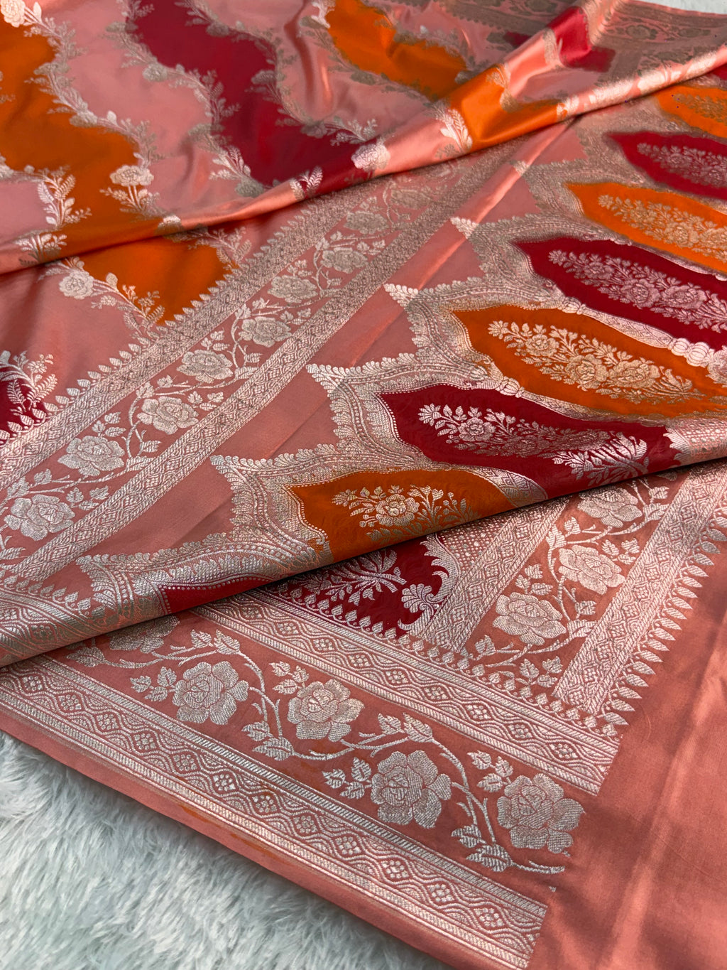 Banarasi mashru silk rangkat saree in aada pattern design in peach, orange, red colour