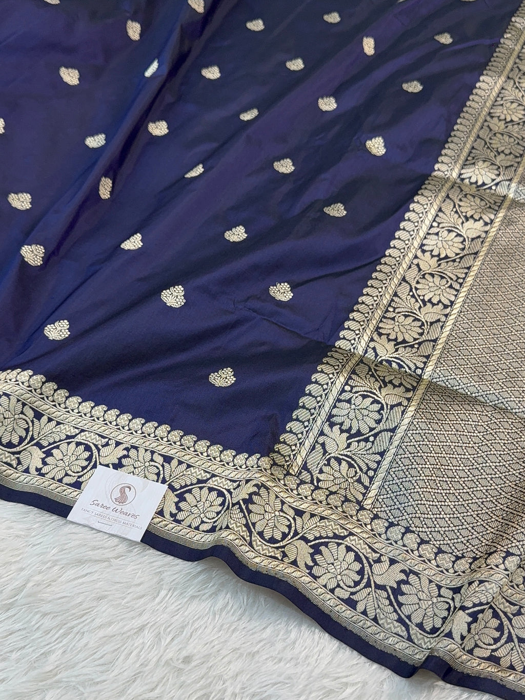 Handwoven pure katan silk saree with interlock weaving motifs in Light gold zari in Navy Blue Colour