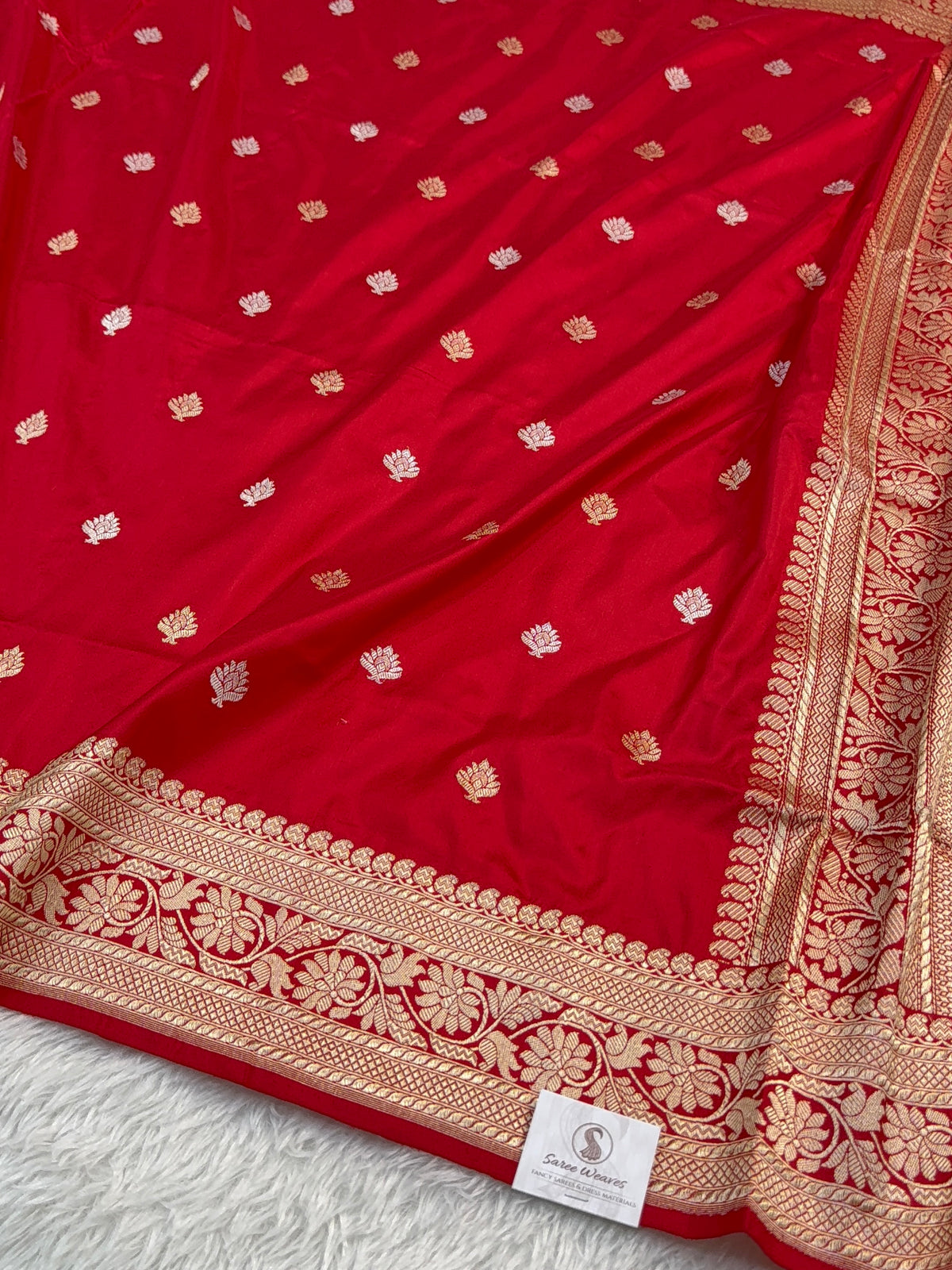 Handwoven pure katan silk saree with interlock weaving motifs with intricate silver and gold zari in red colour
