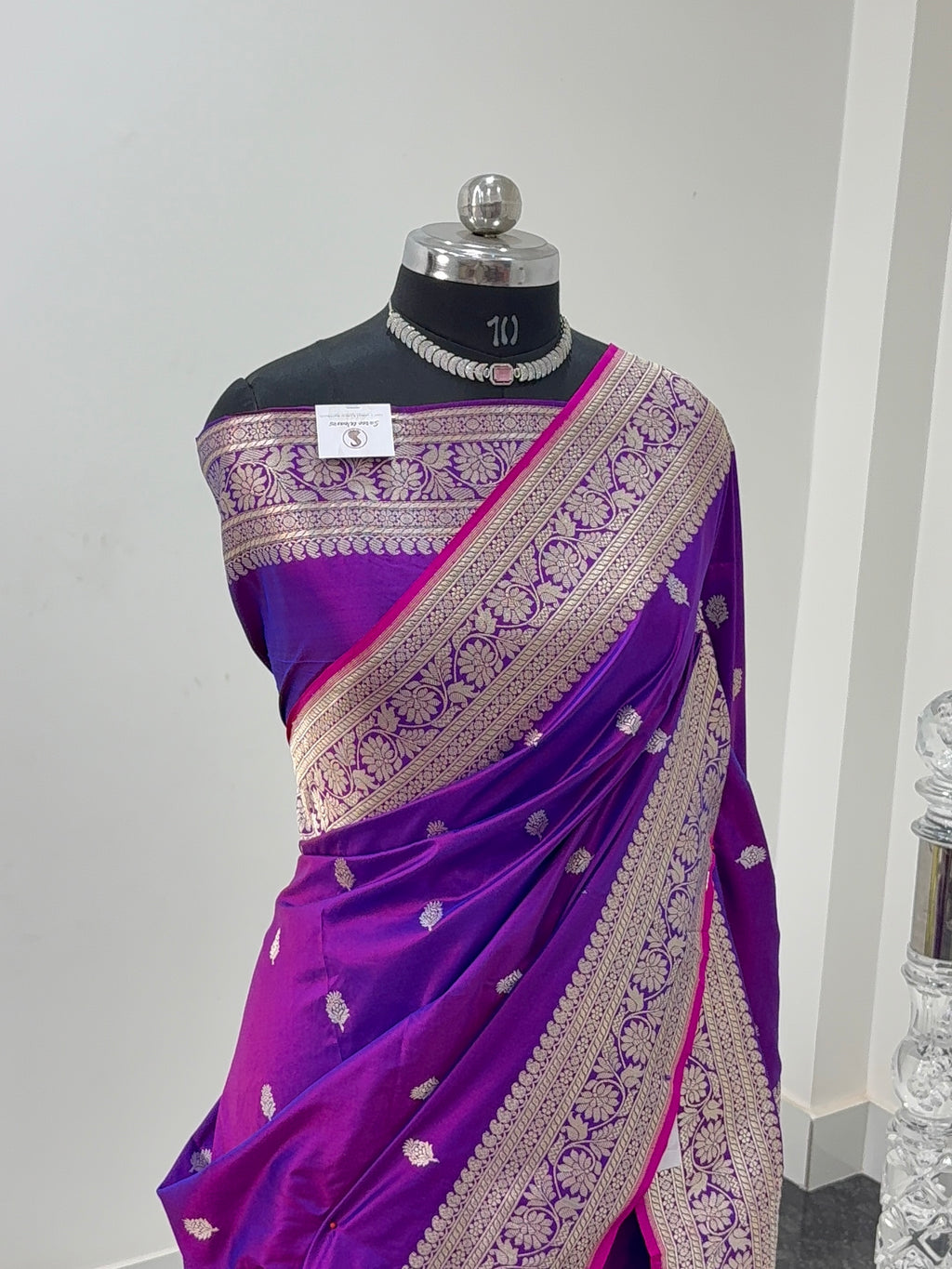 Handwoven pure katan silk saree with interlock weaving motifs in intricate silver and gold zari with Rani Edge in Deep Violet colour